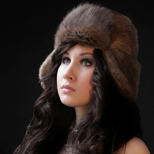 woman wearing a muskrat fur bomber hat