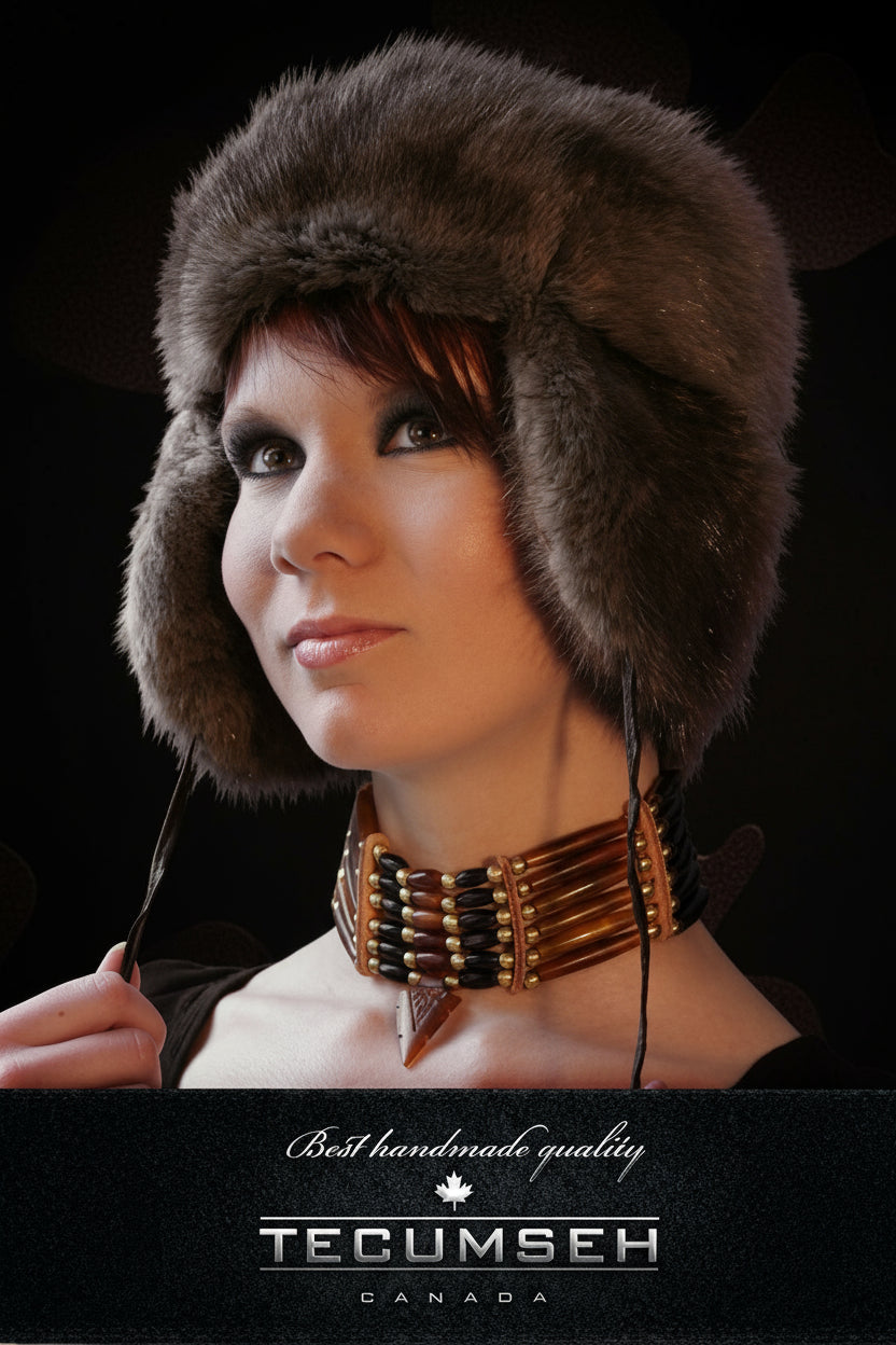 Woman wearing a fur hat with 'Tecumseh Canada' branding on a black background