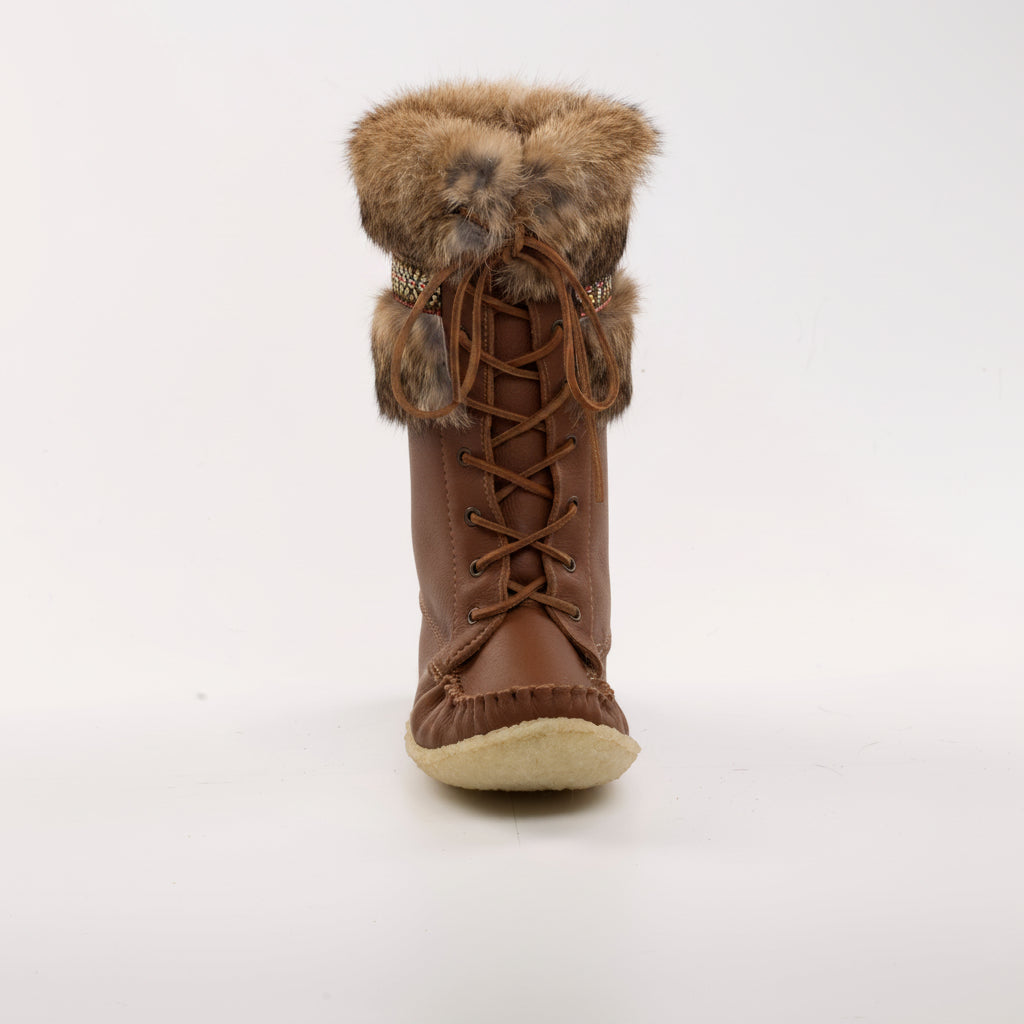 Brown winter boot with fur trim on a white background