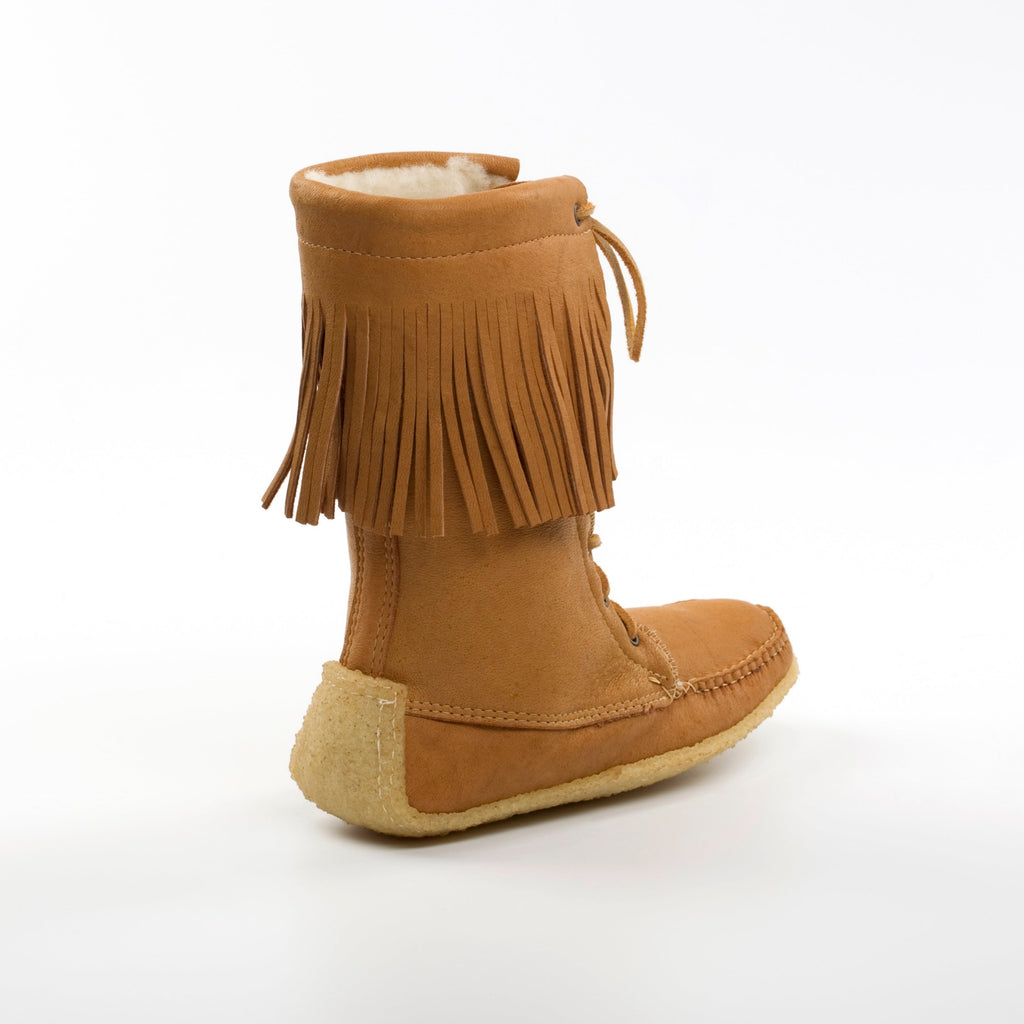 Brown moccasin boot with fringes on a white background