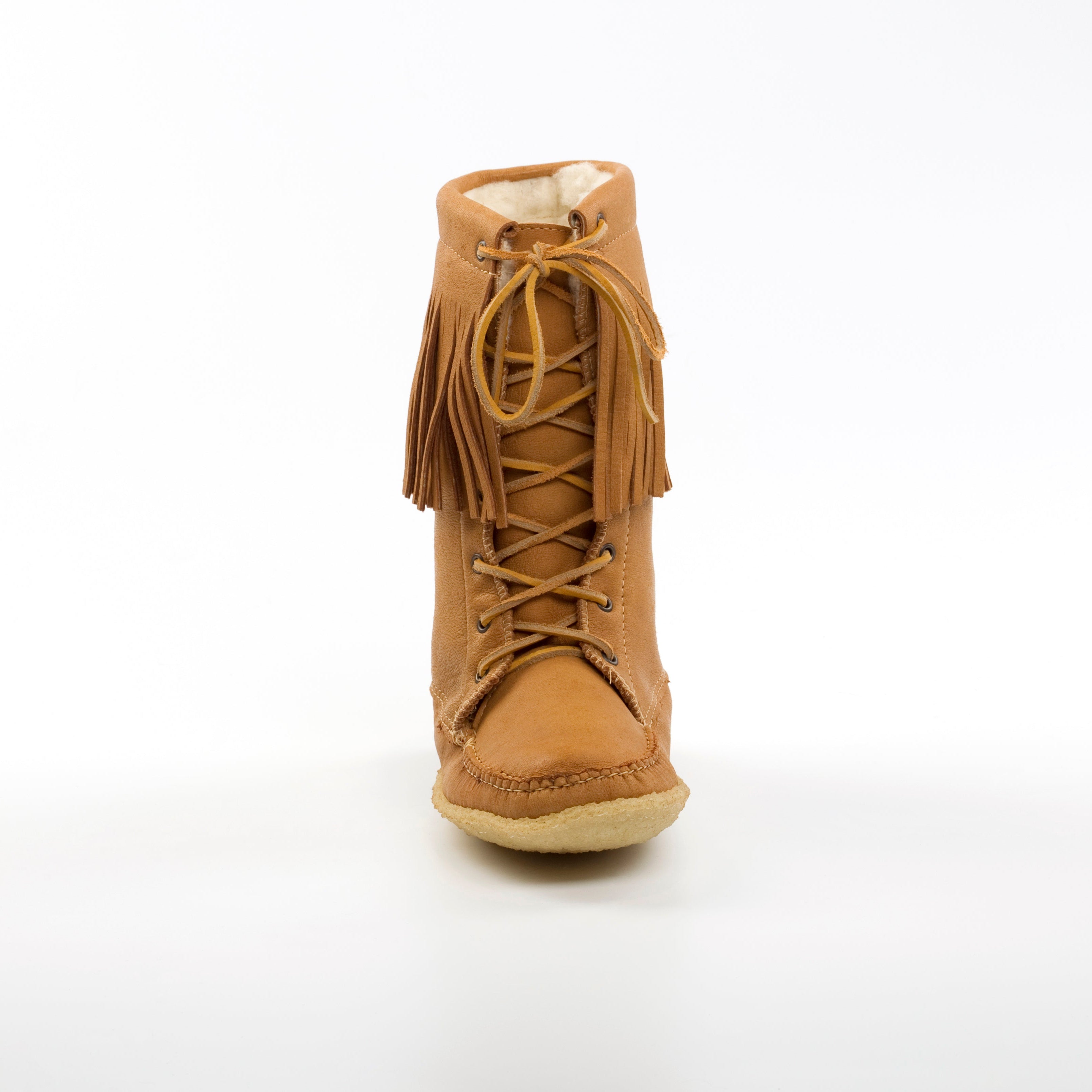 Tan lace-up boot with fringes on a white background