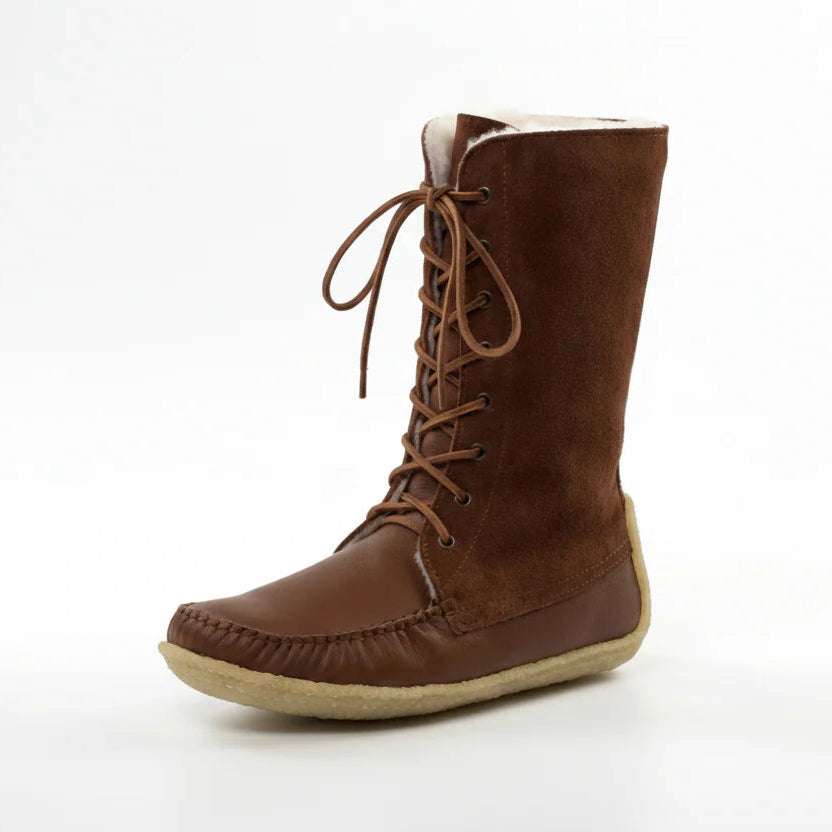 Brown boot with laces on a white background