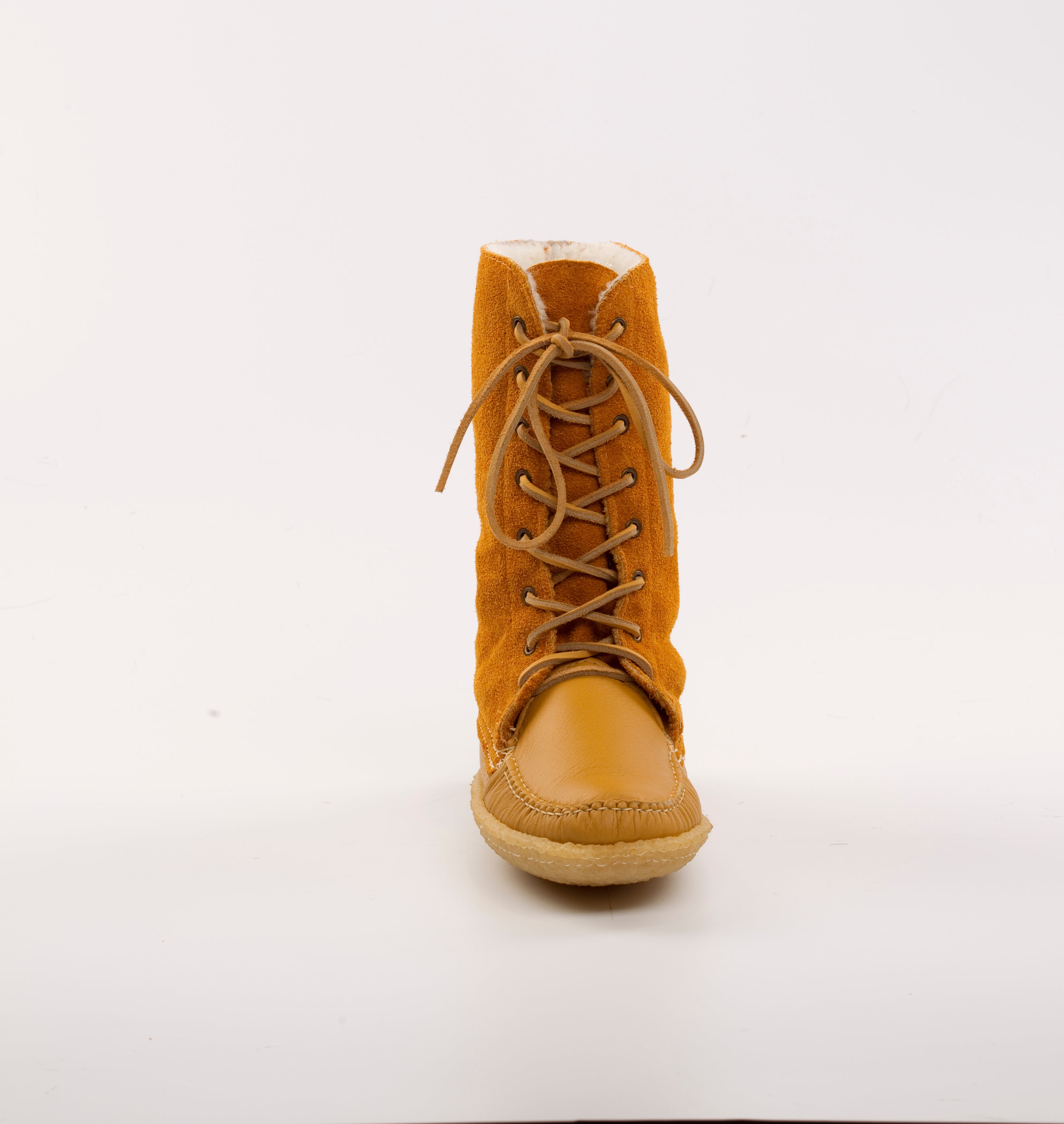Yellow boot with laces on a white background