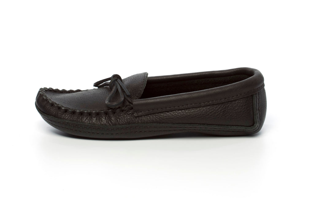 Black leather moccasin shoe on a white background