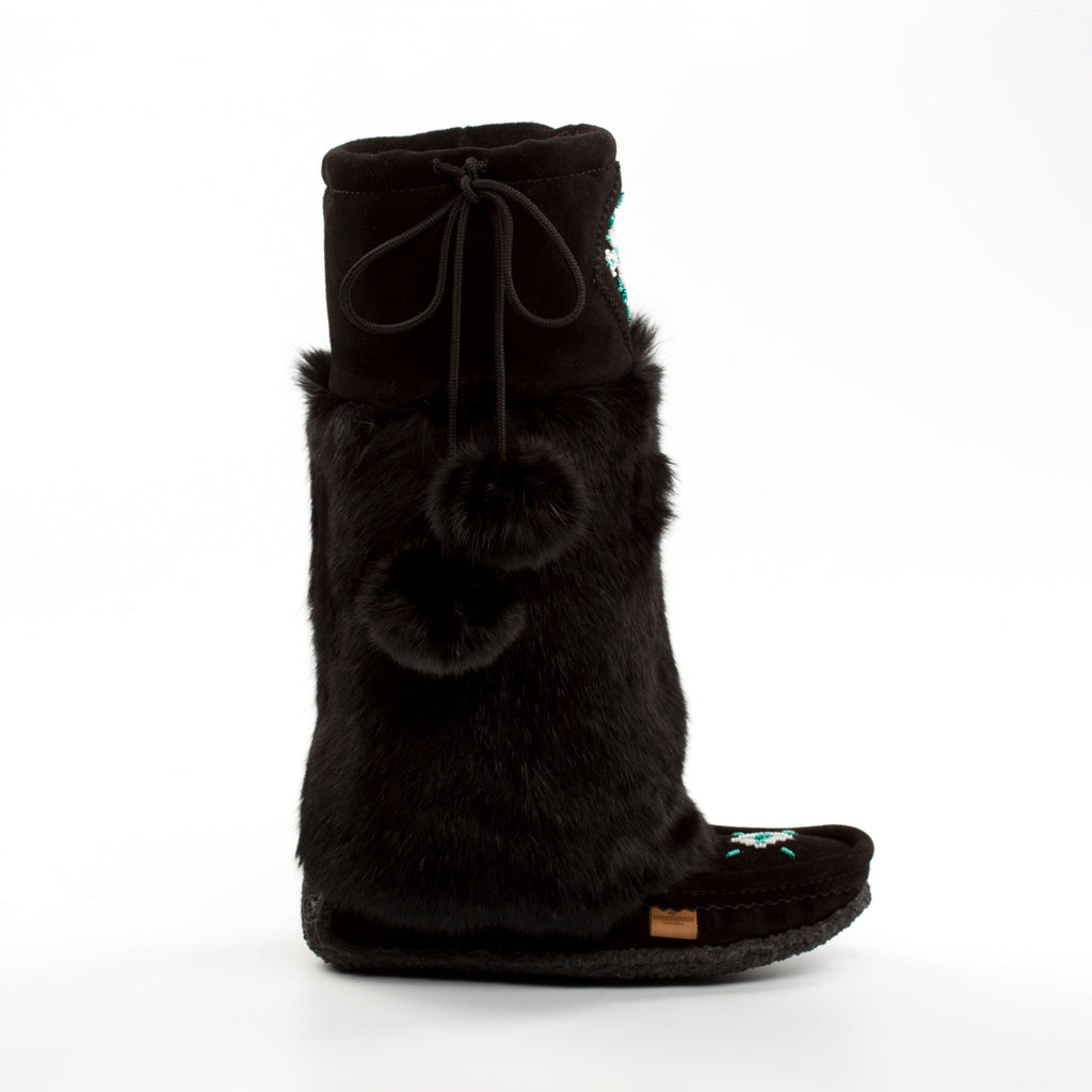 Black furry slipper boot on a white background