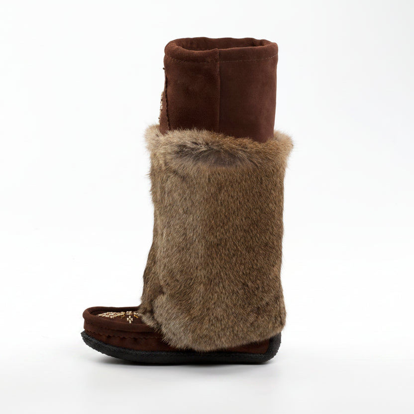 Brown boot with fur trim on a white background