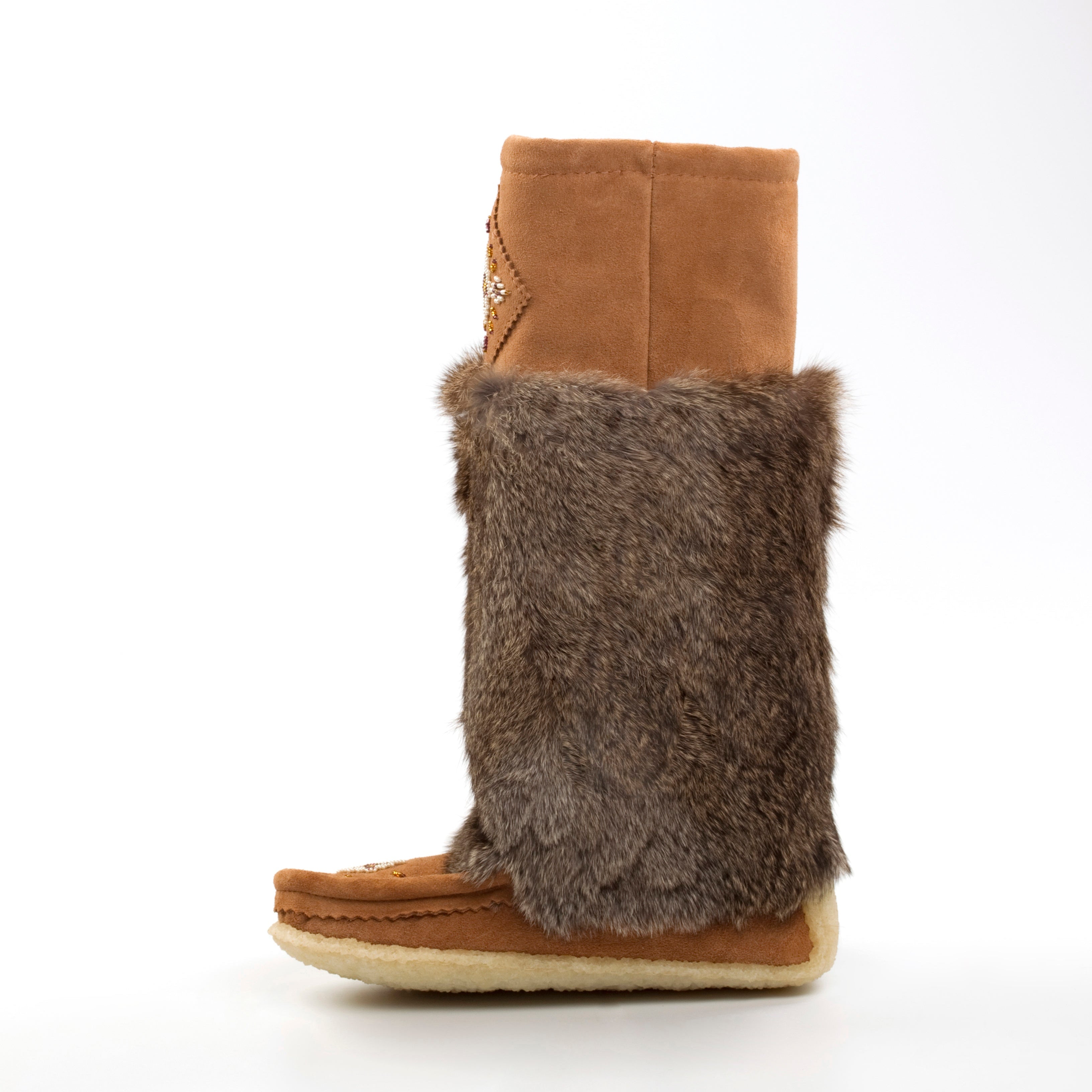 Brown mukluk boot with fur cuff on a white background