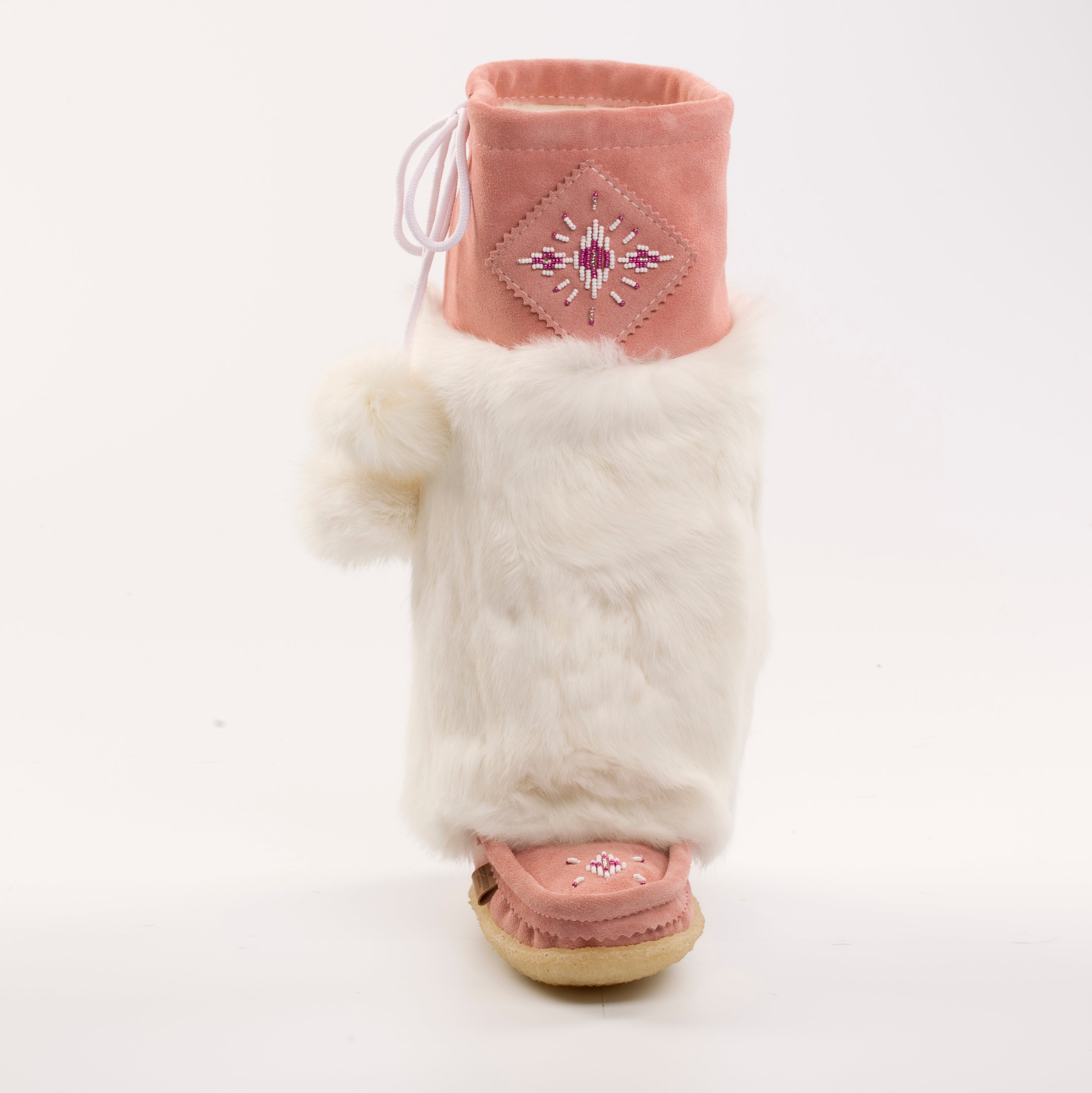 Pink mukluk with white fur trim on a white background