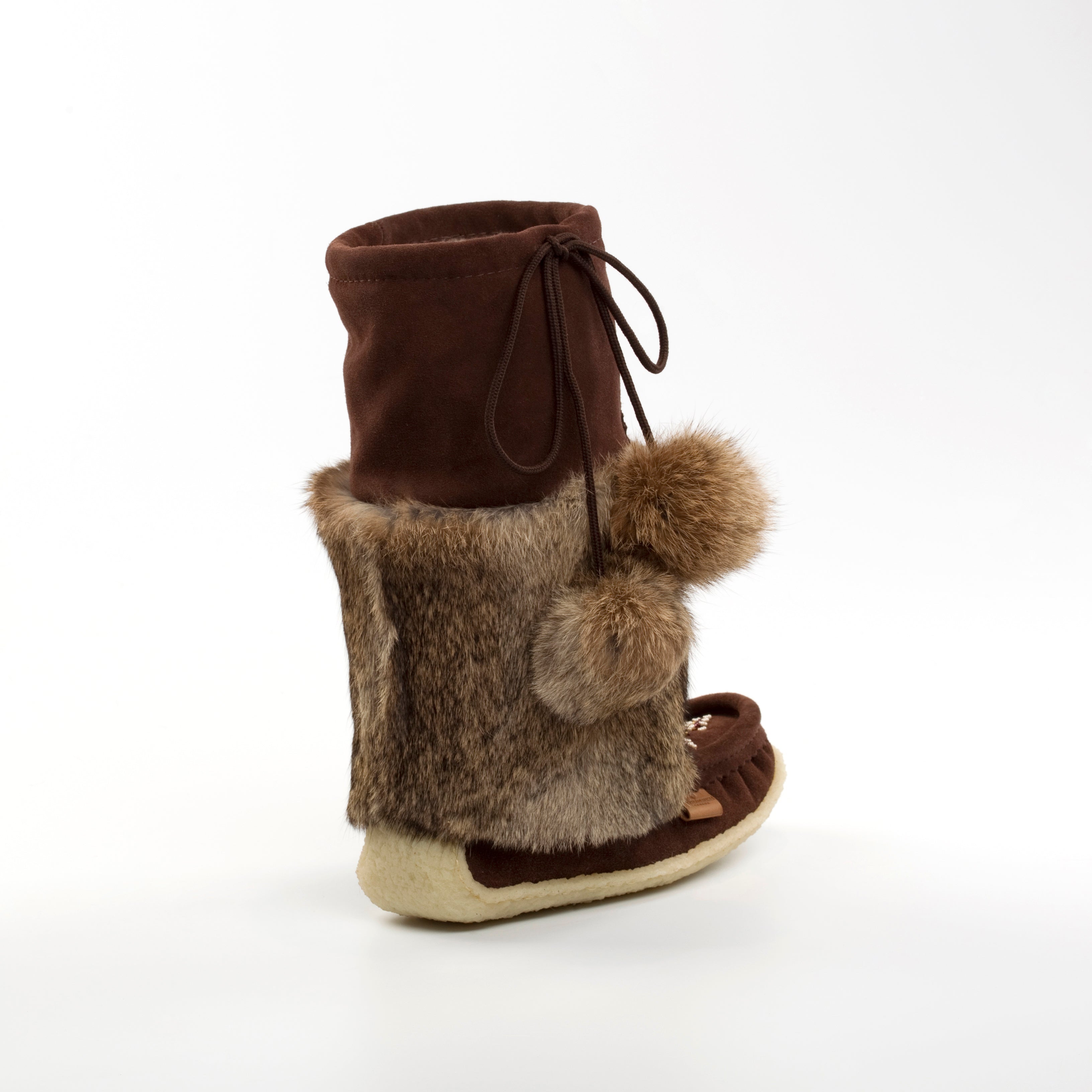 Brown boot with fur trim on a white background