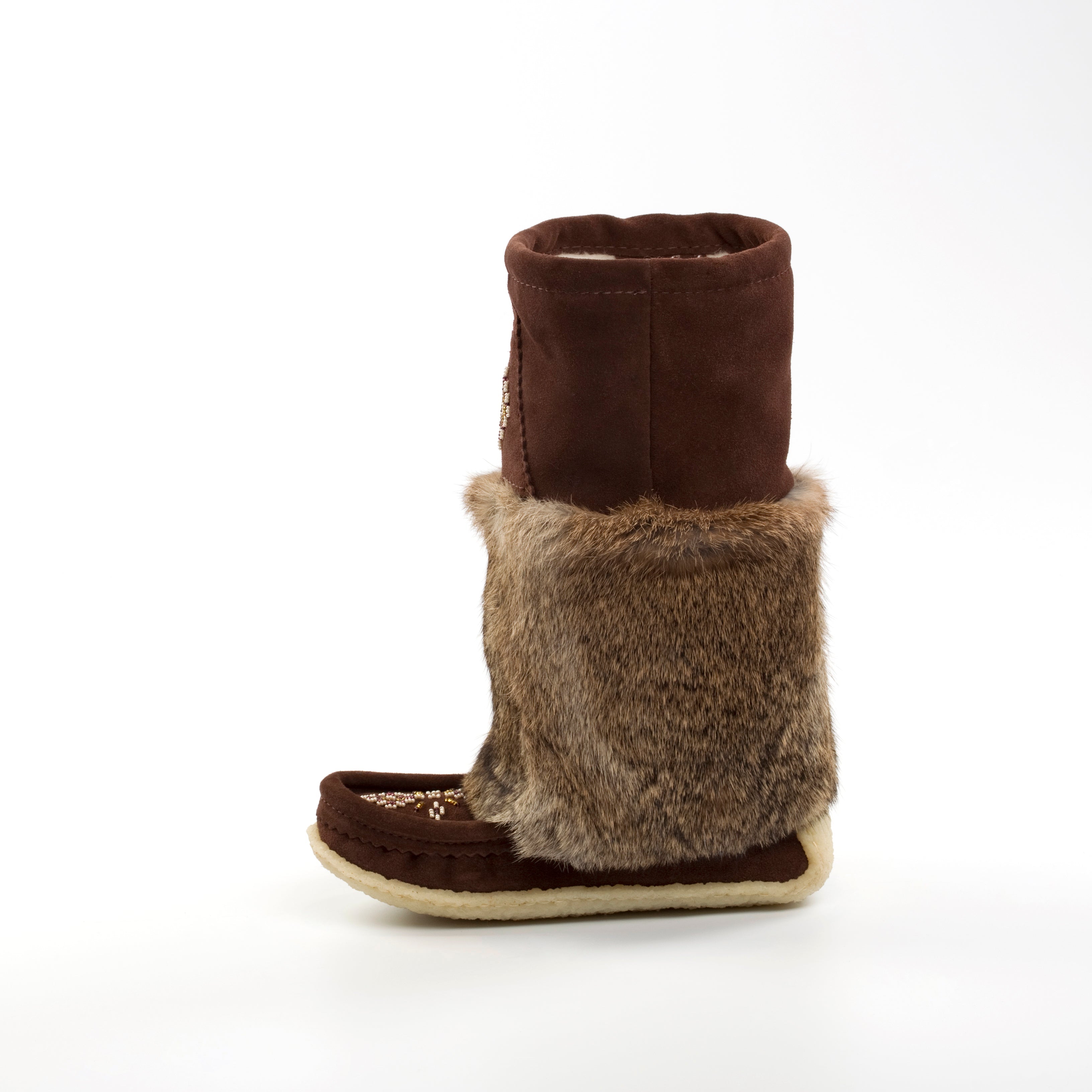 Brown Mukluks mid calf with fur trim on a white background