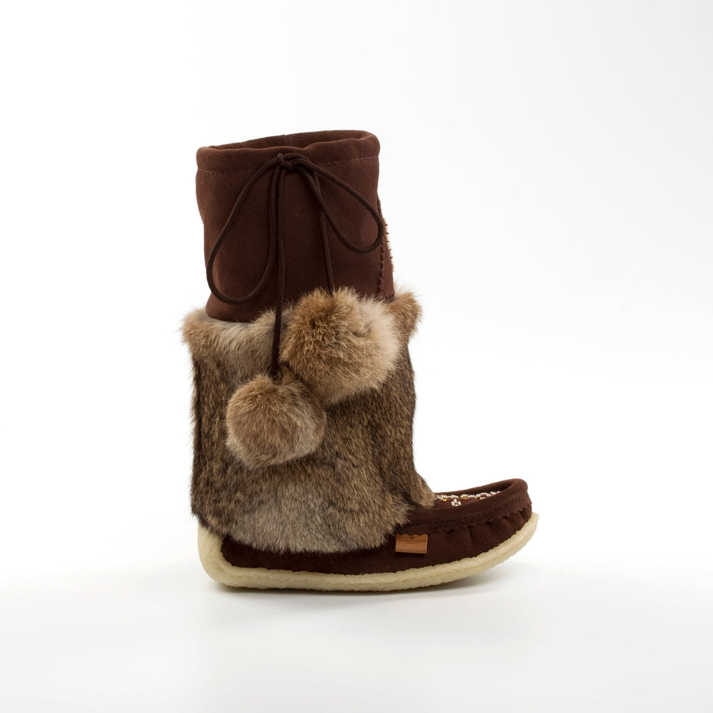 Brown boot with fur trim on a white background
