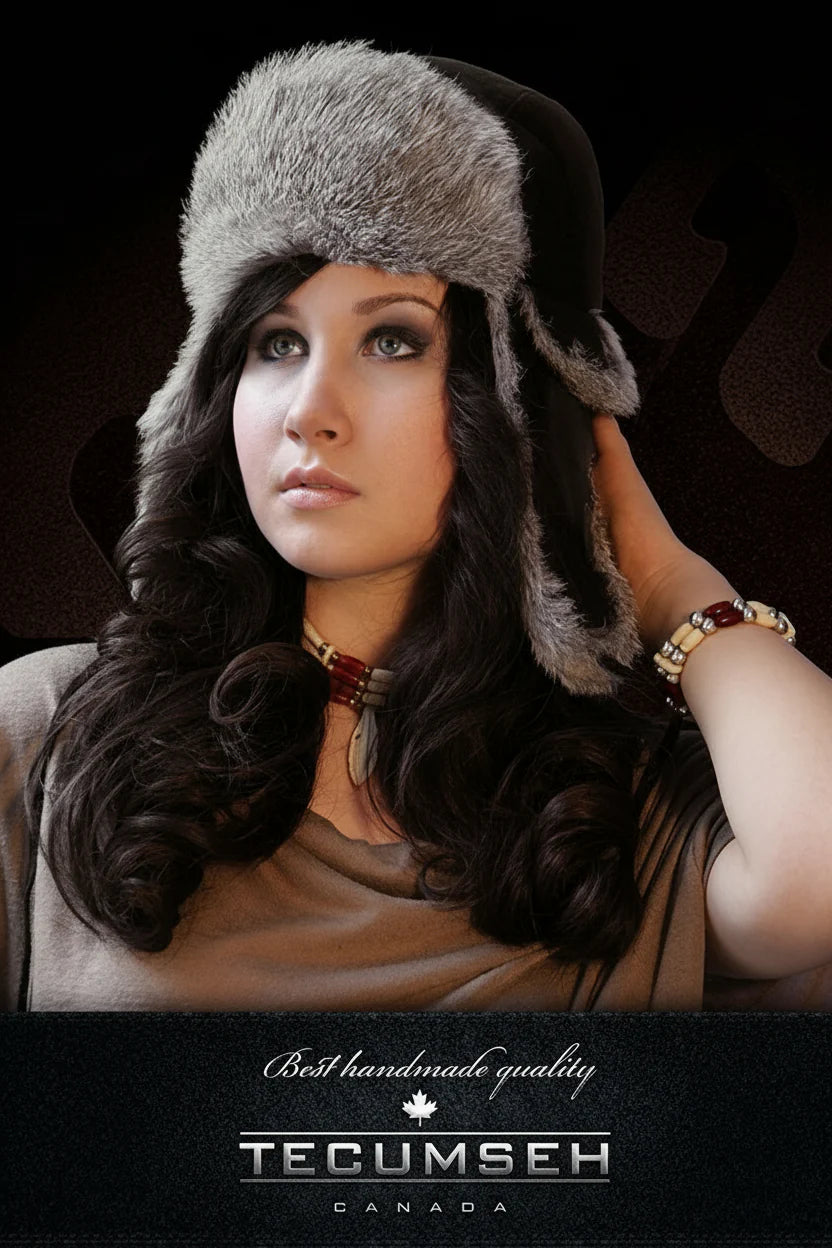 Woman wearing a fur hat with 'Tecumseh Canada' branding on a dark background