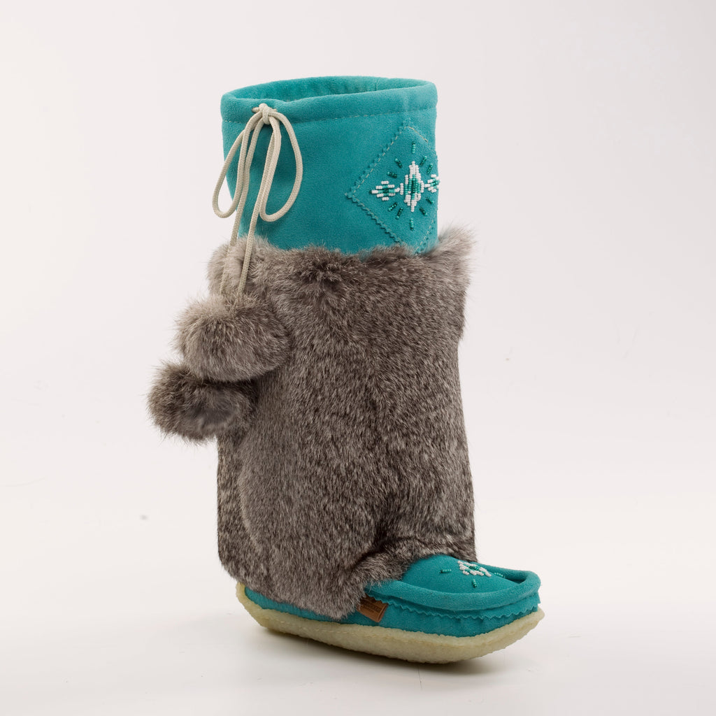 Teal mukluks with gray fuzzy rabbit fur design on a white background