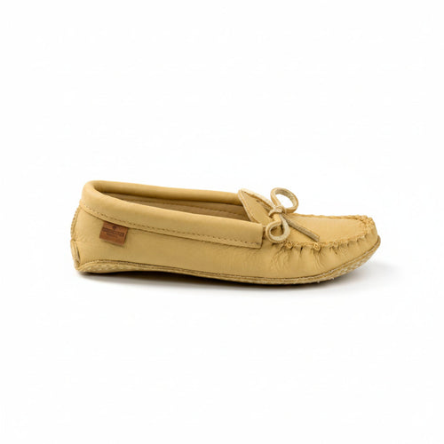 Beige moccasin slipper on a white background