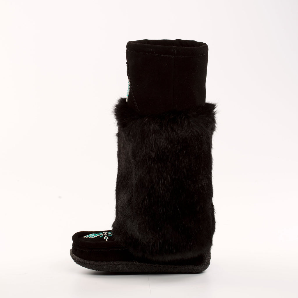 Black mukluk boot with fur trim on a white background