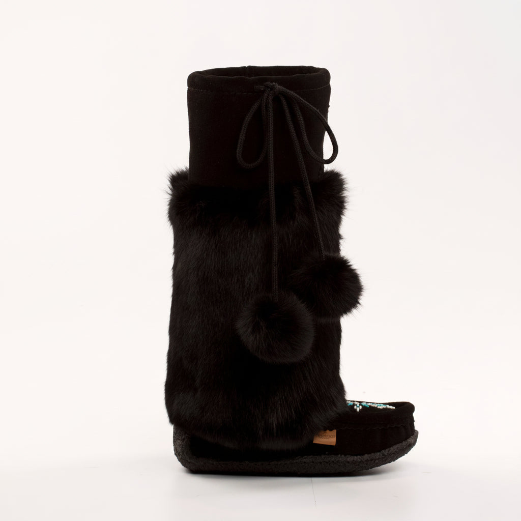 Black fur boot on a white background