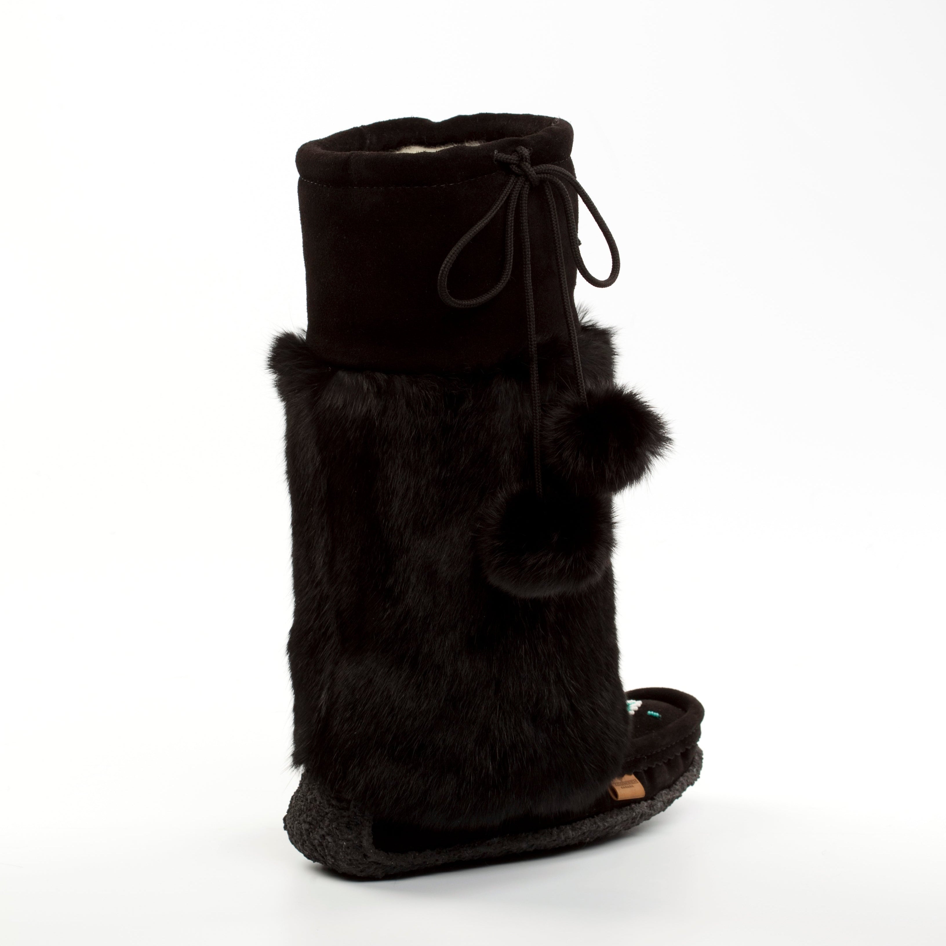 Black fur glove on a white background