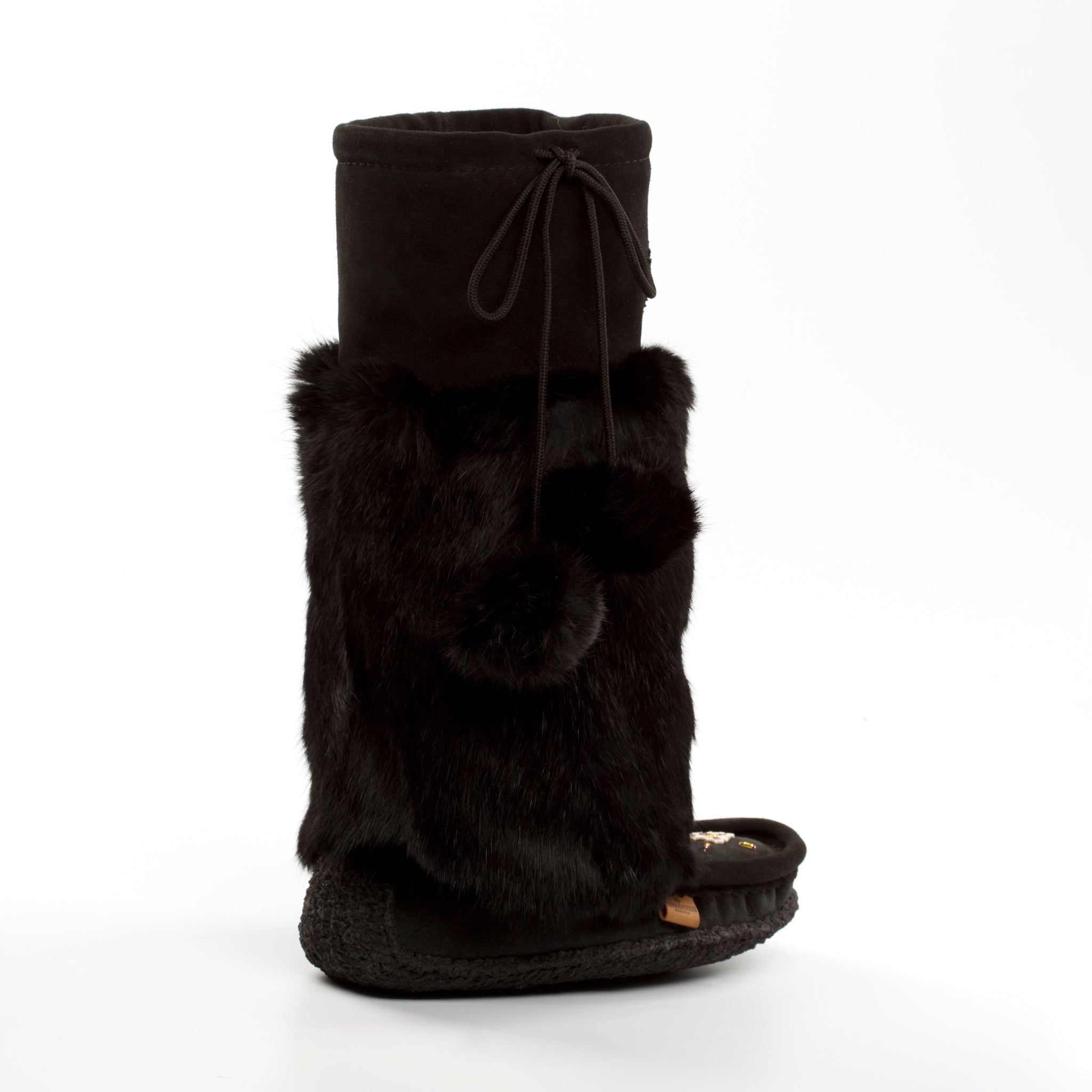 Black boot with fur trim on a white background