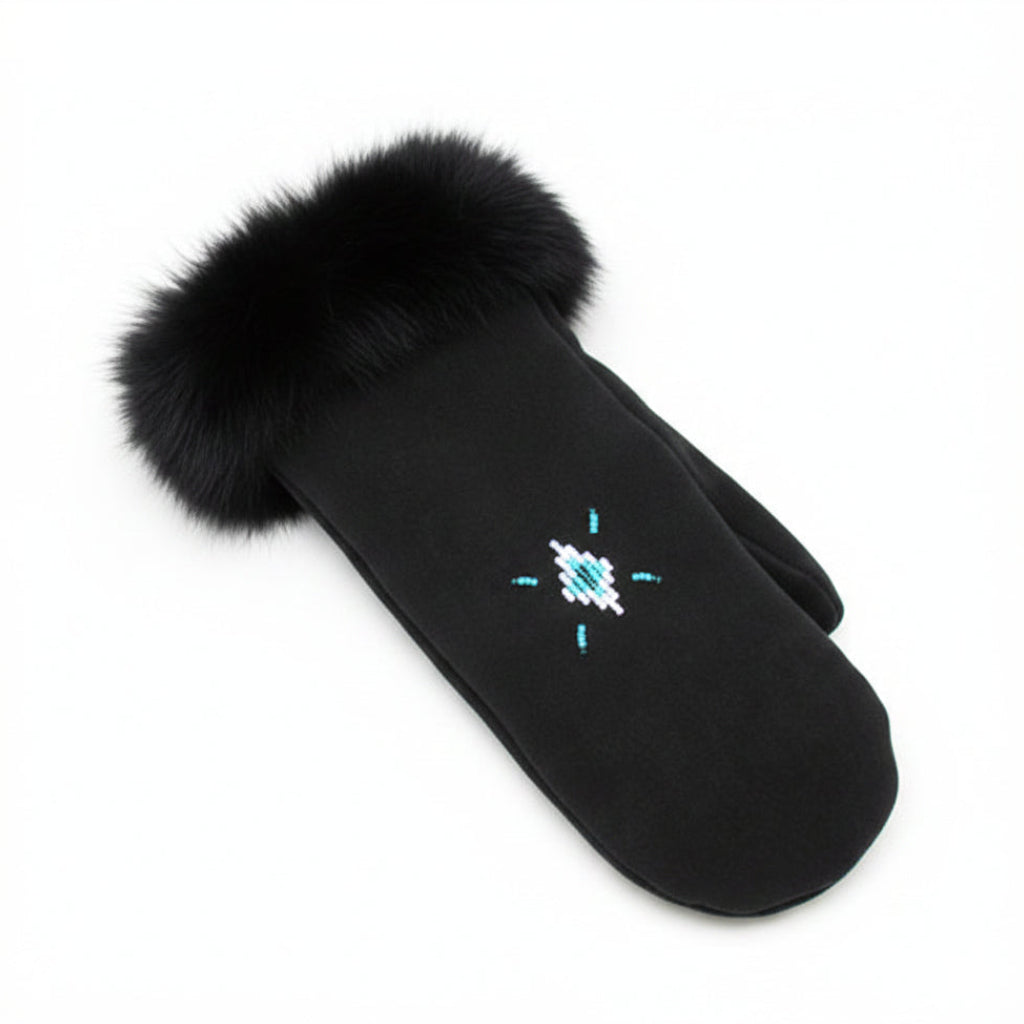 Black mitten with blue snowflake design on a white background
