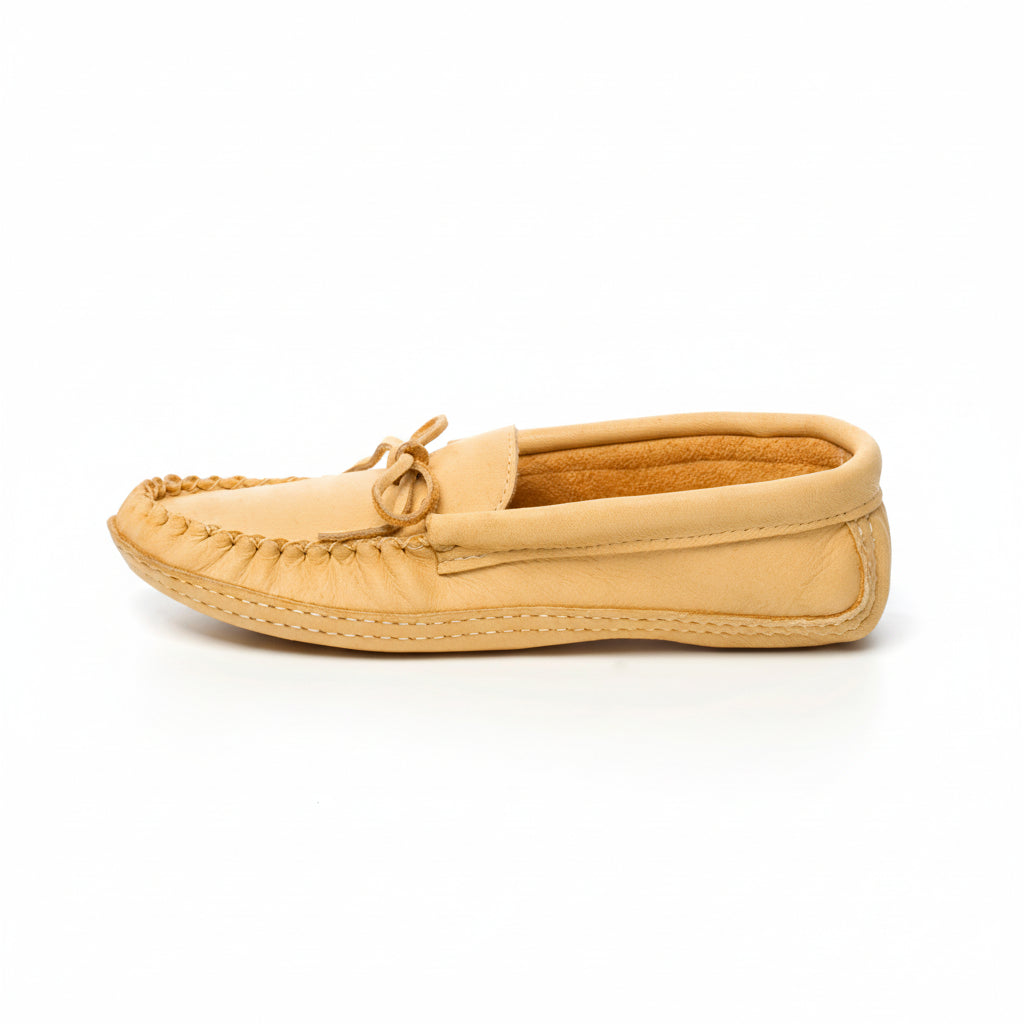 Beige moccasin slipper on a white background