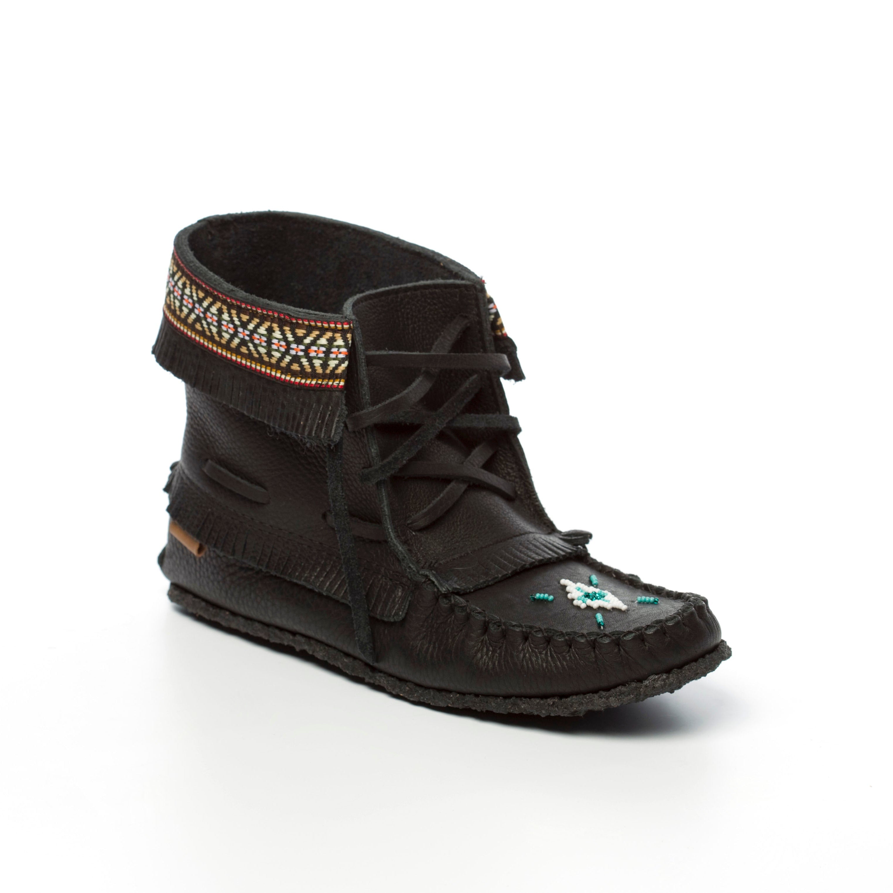 Black moccasin-style shoe with decorative elements on a white background
