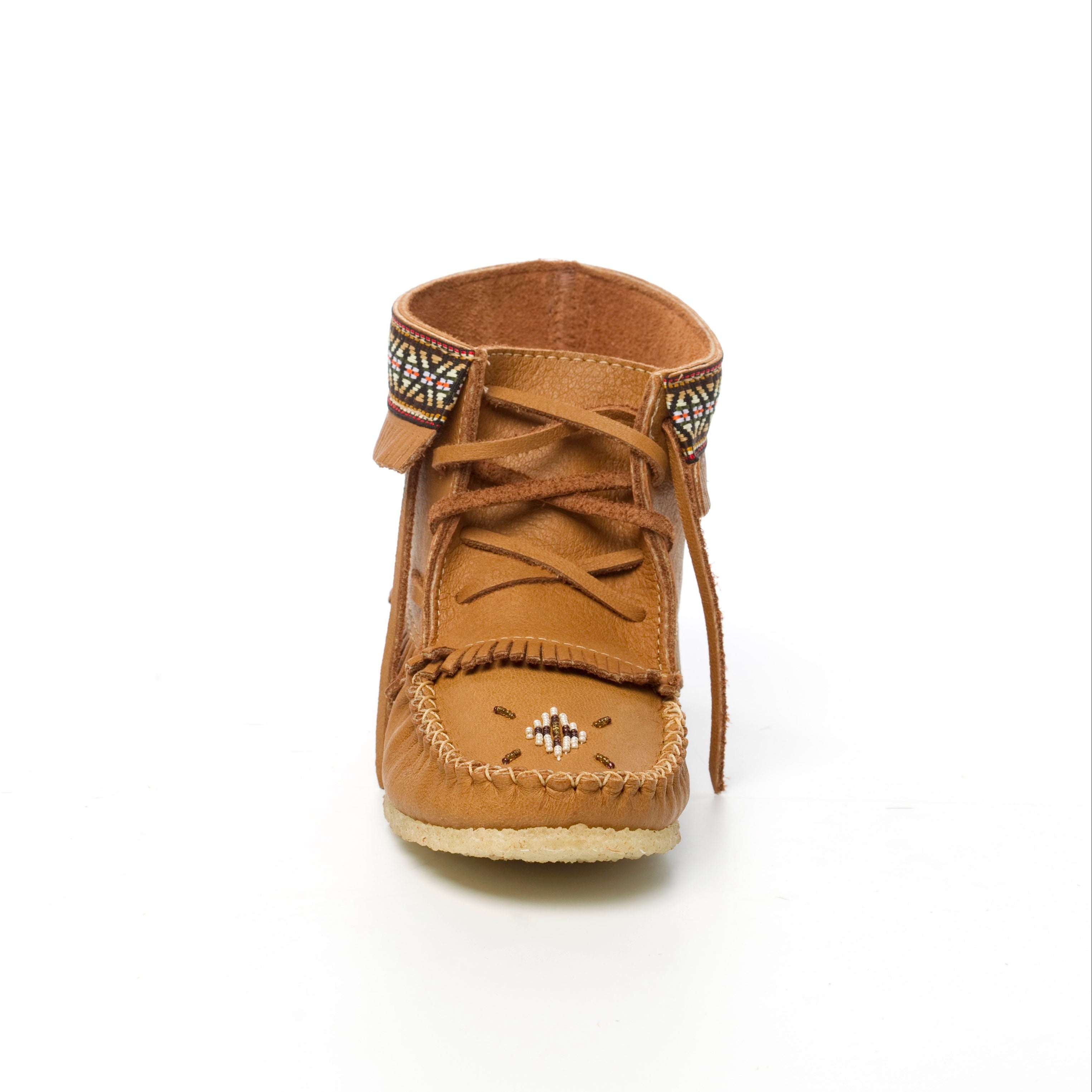 Brown moccasin-style shoe with decorative elements on a white background