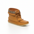 Brown moccasin-style shoe with decorative elements on a white background