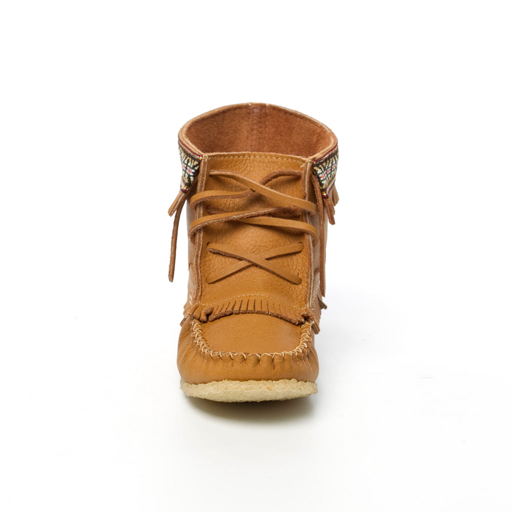 Brown leather boot with fringes on a white background