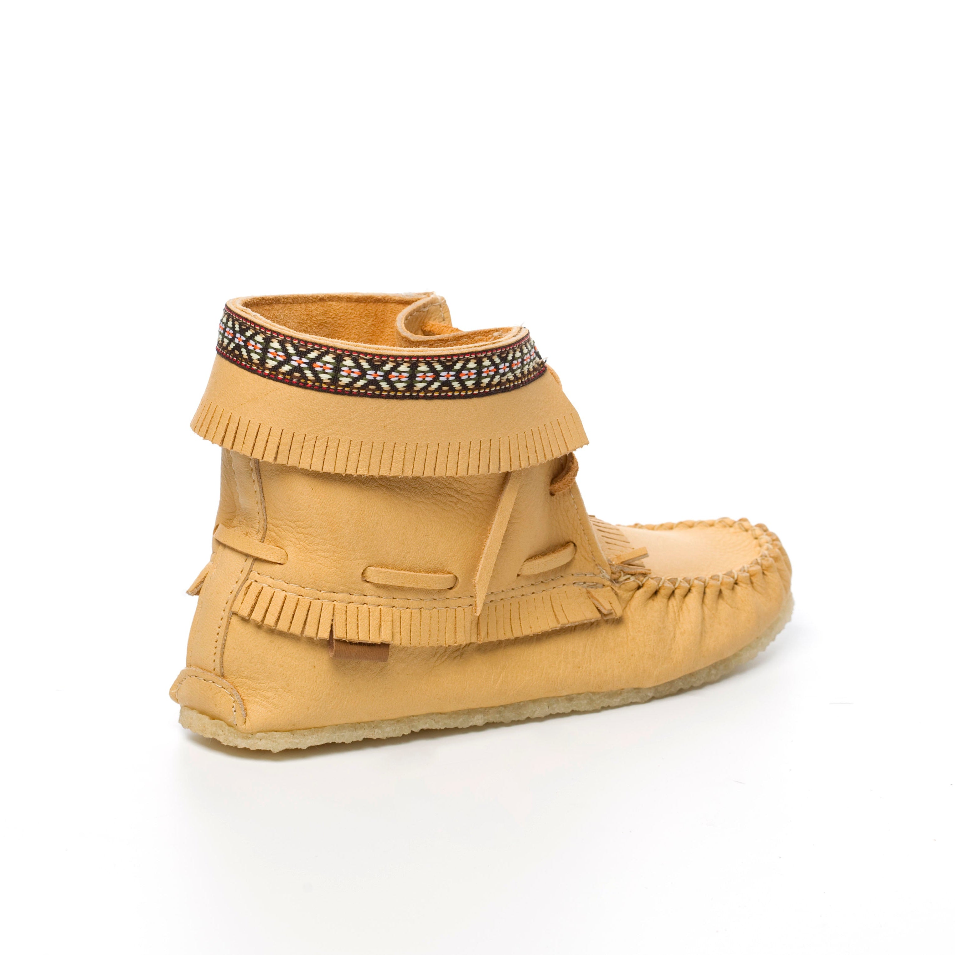 Tan moccasin shoe with decorative band on a white background