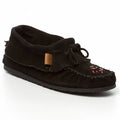 Black slip-on moccasin shoe with a small tag on a white background