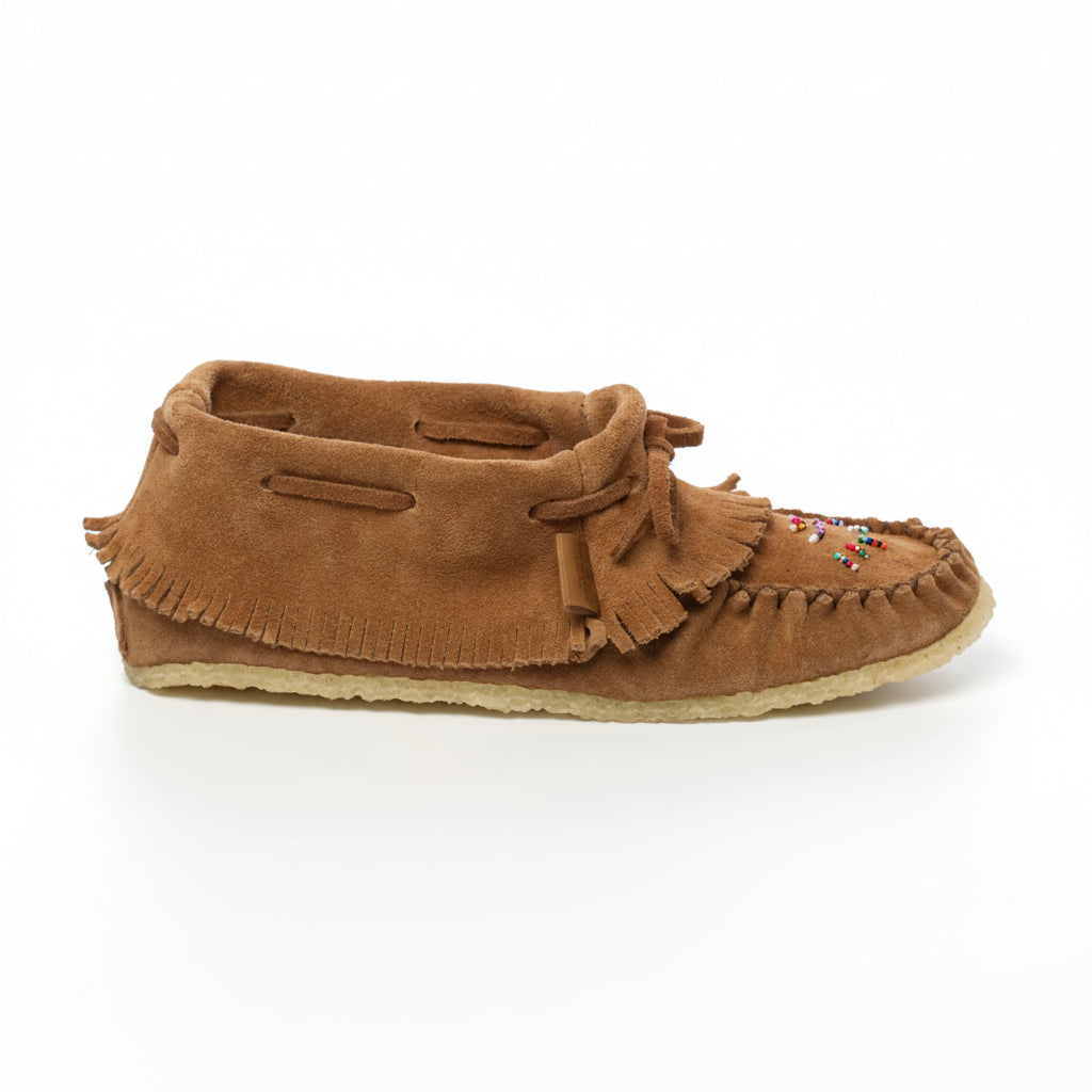 Brown moccasin shoe with fringes on a white background