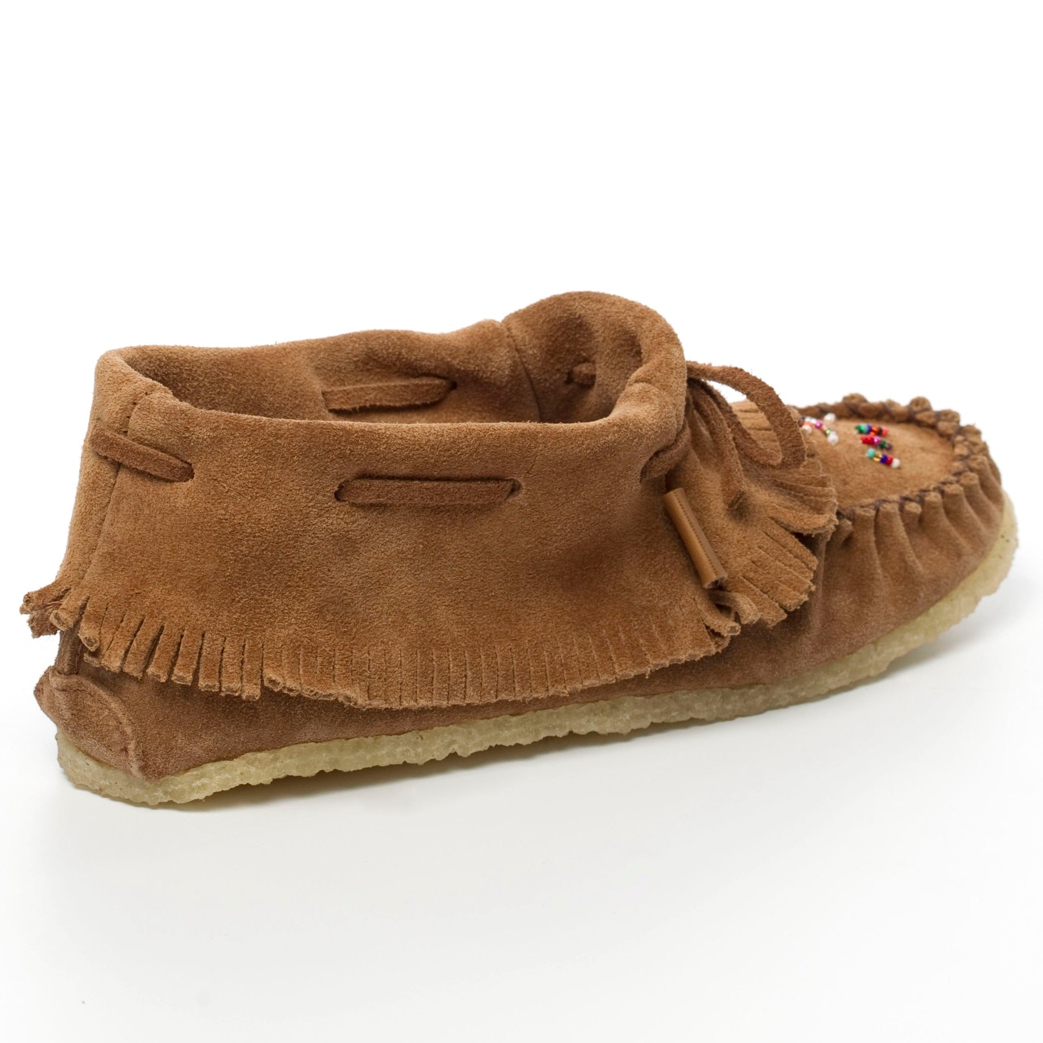Brown moccasin slipper with fringes on a white background