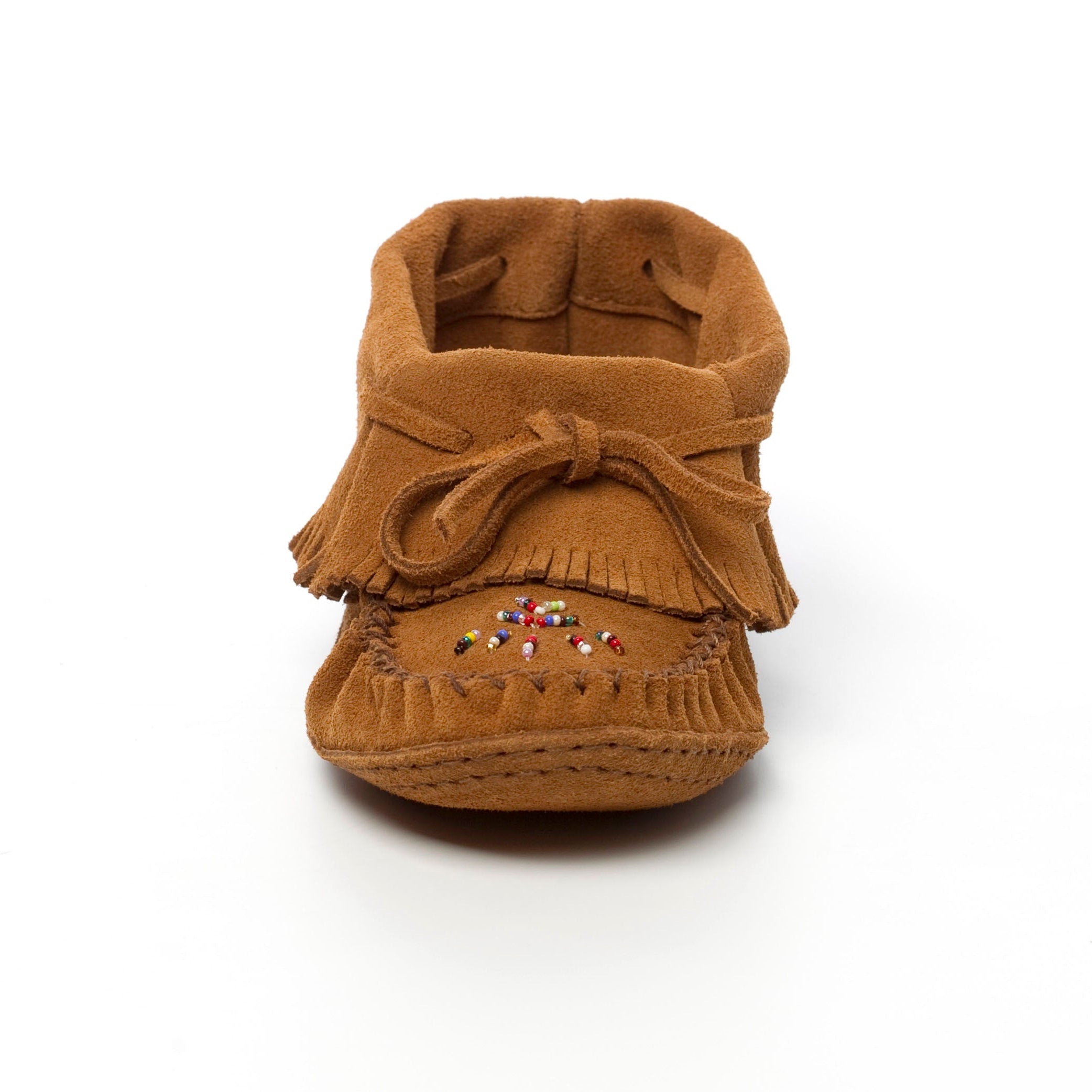 Brown moccasin shoe with decorative elements on a white background