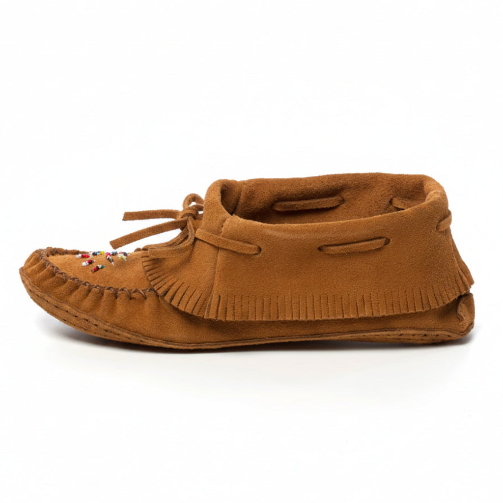 Dark Tan Fringe moccasins indoor with white background 
