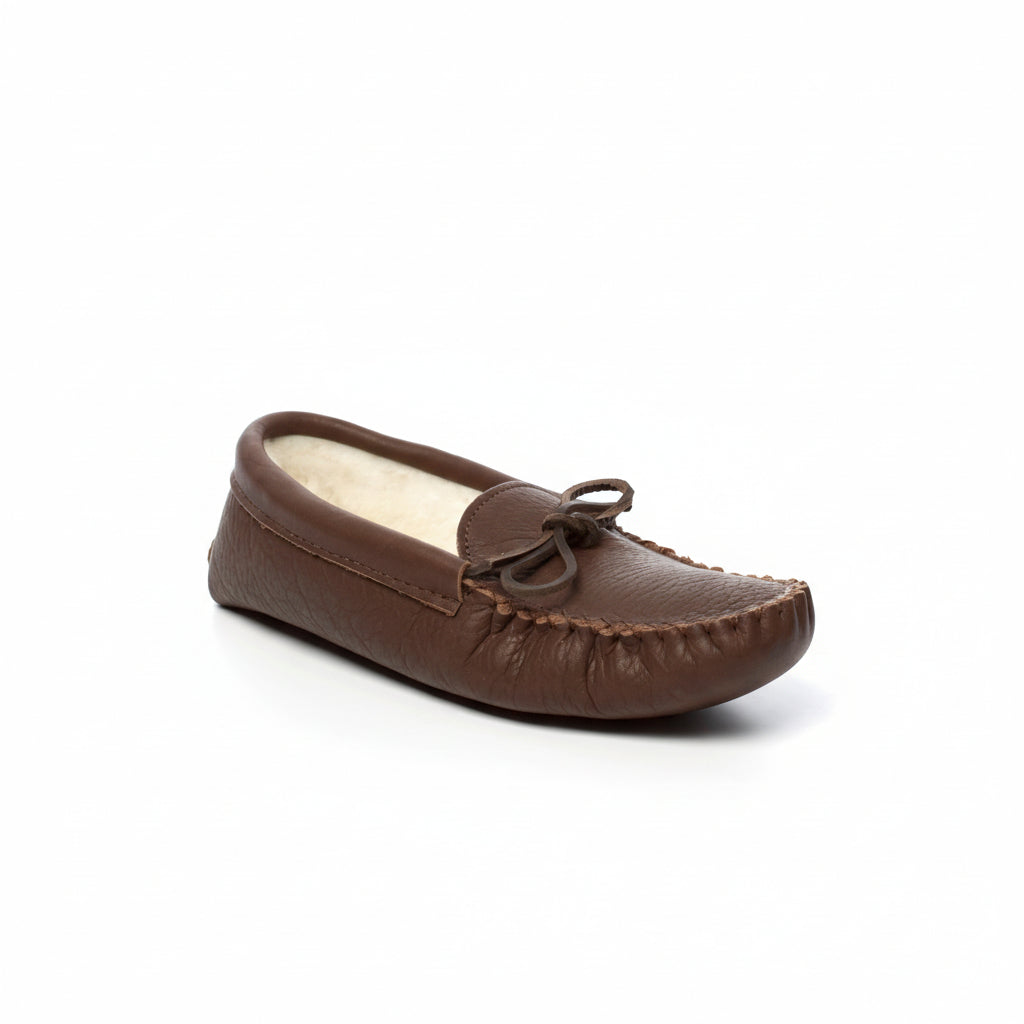 Brown moccasin shoe on a white background