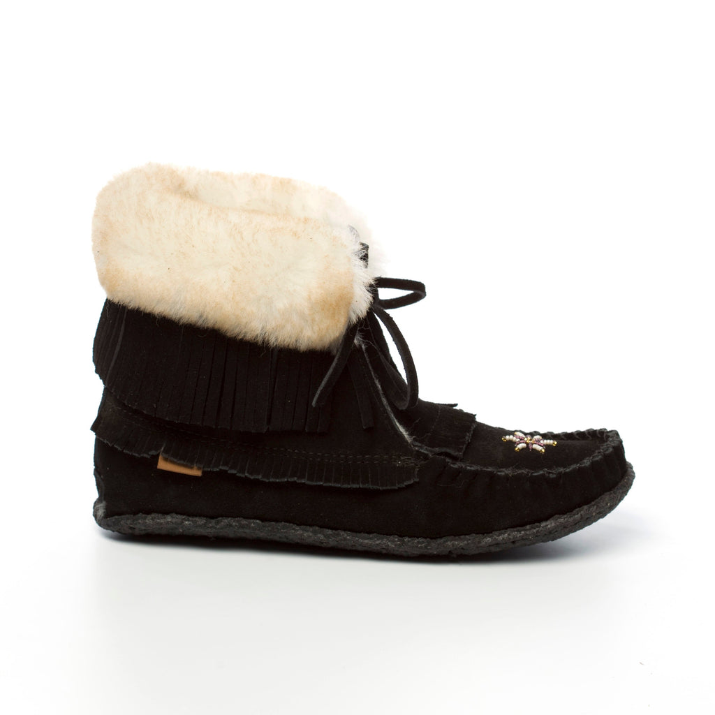 Black suede boot with white sheepskin lining on a white background