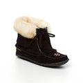 Black boot with white sheepskin lining on a white background