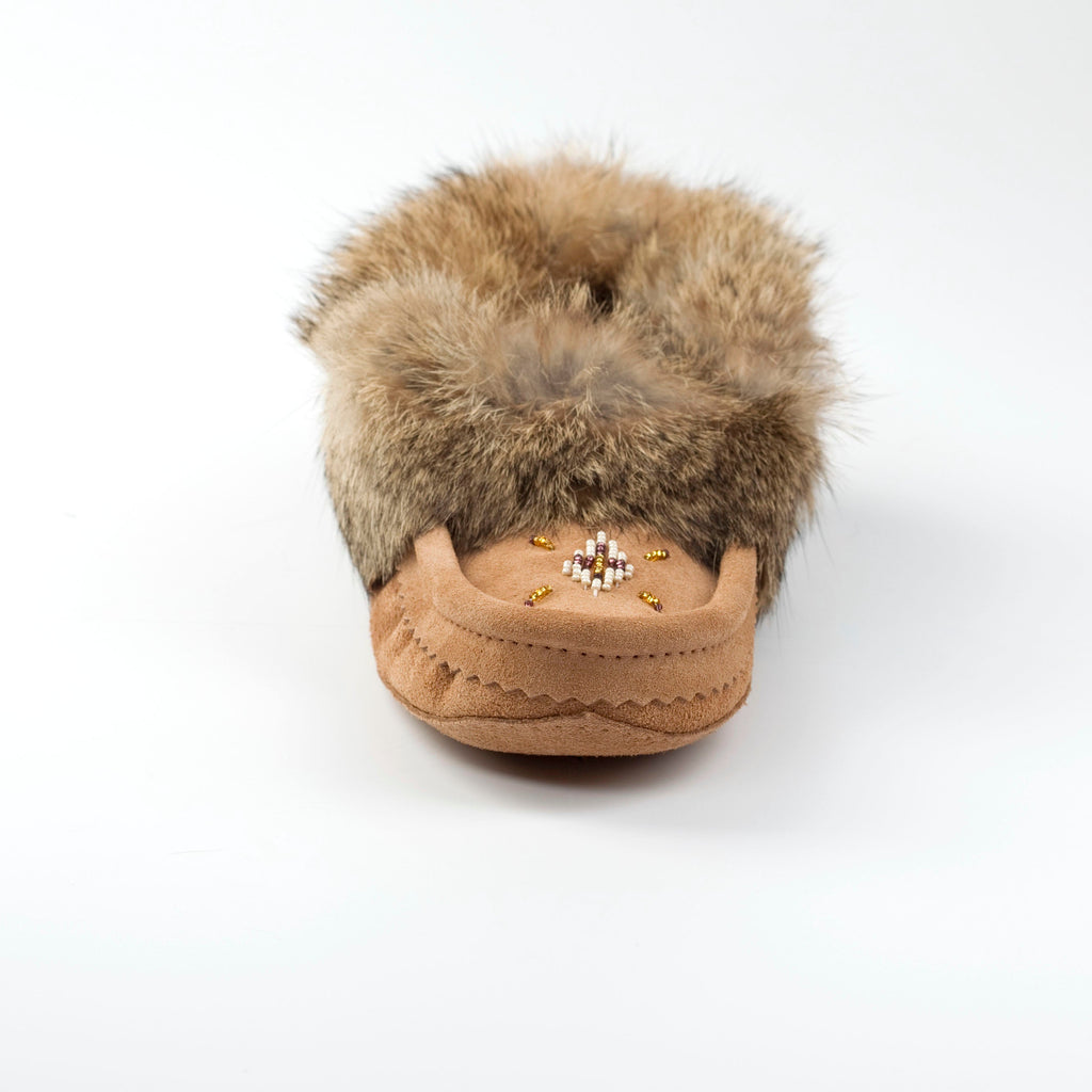 Brown slipper with fur on a white background