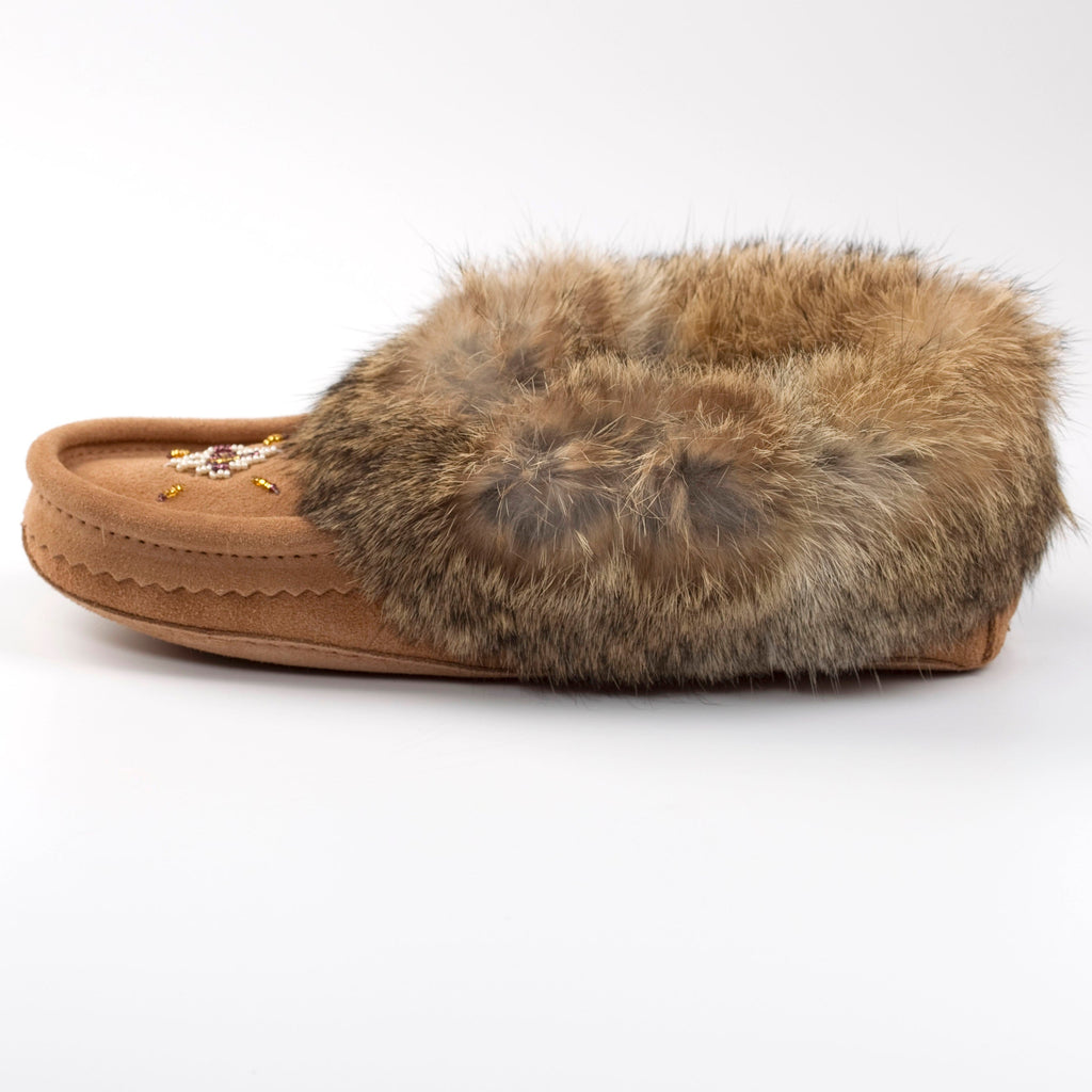 Brown slipper with fur trim on a white background