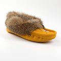 Yellow slipper with fur trim on a white background