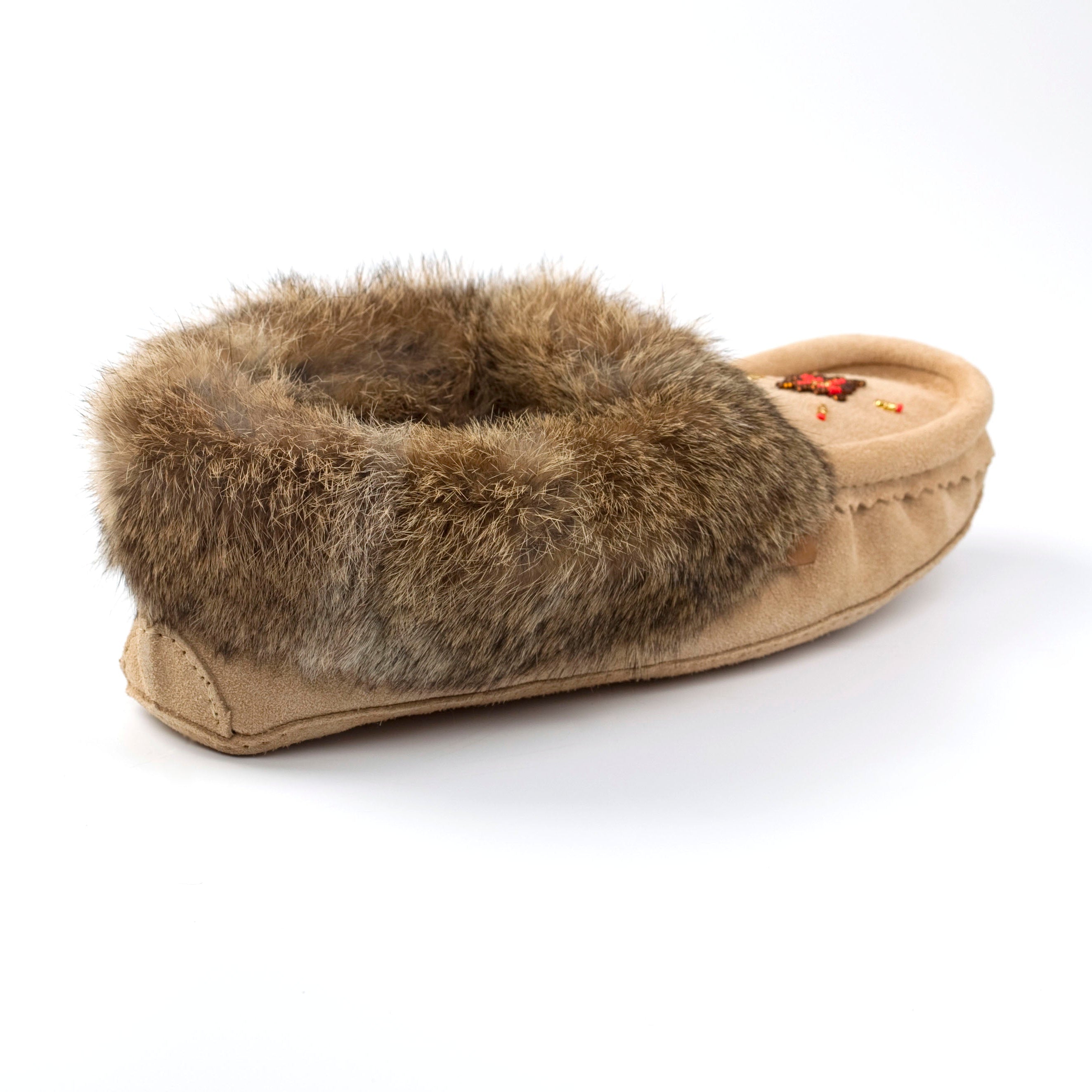 Brown slipper with fur trim on a white background