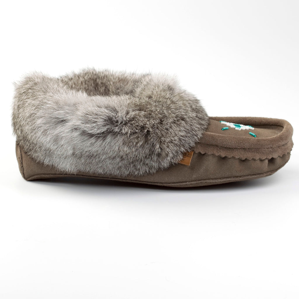 Charcoal grey moccasin slipper with gray fur on a white background