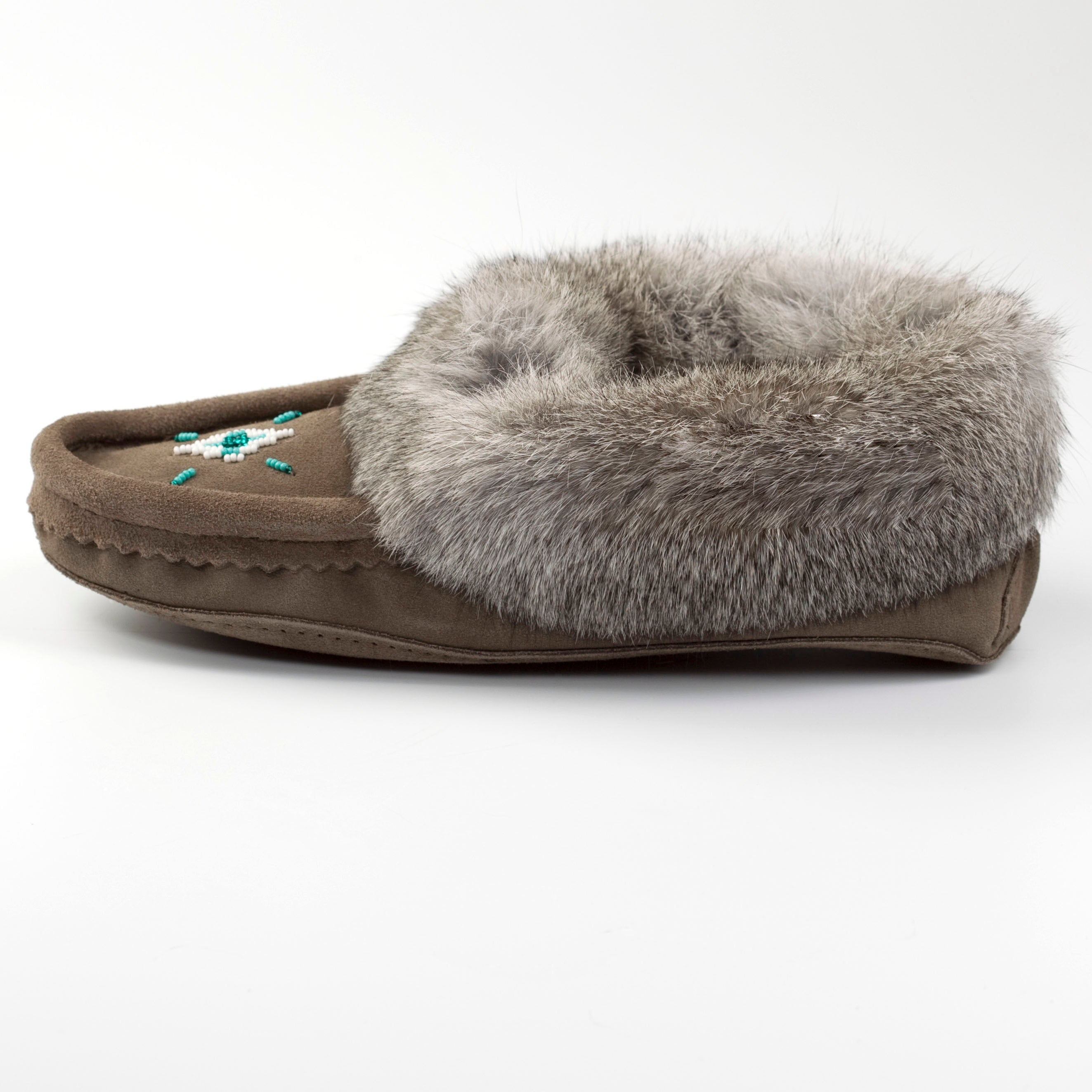 grey slipper with gray fur on a white background