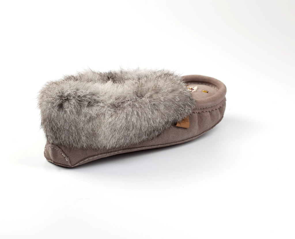 Brown slipper with gray fur on a white background