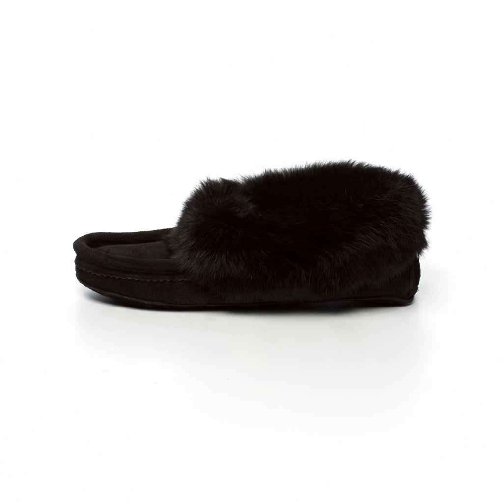 Black moccasin slipper with fur trim on a white background