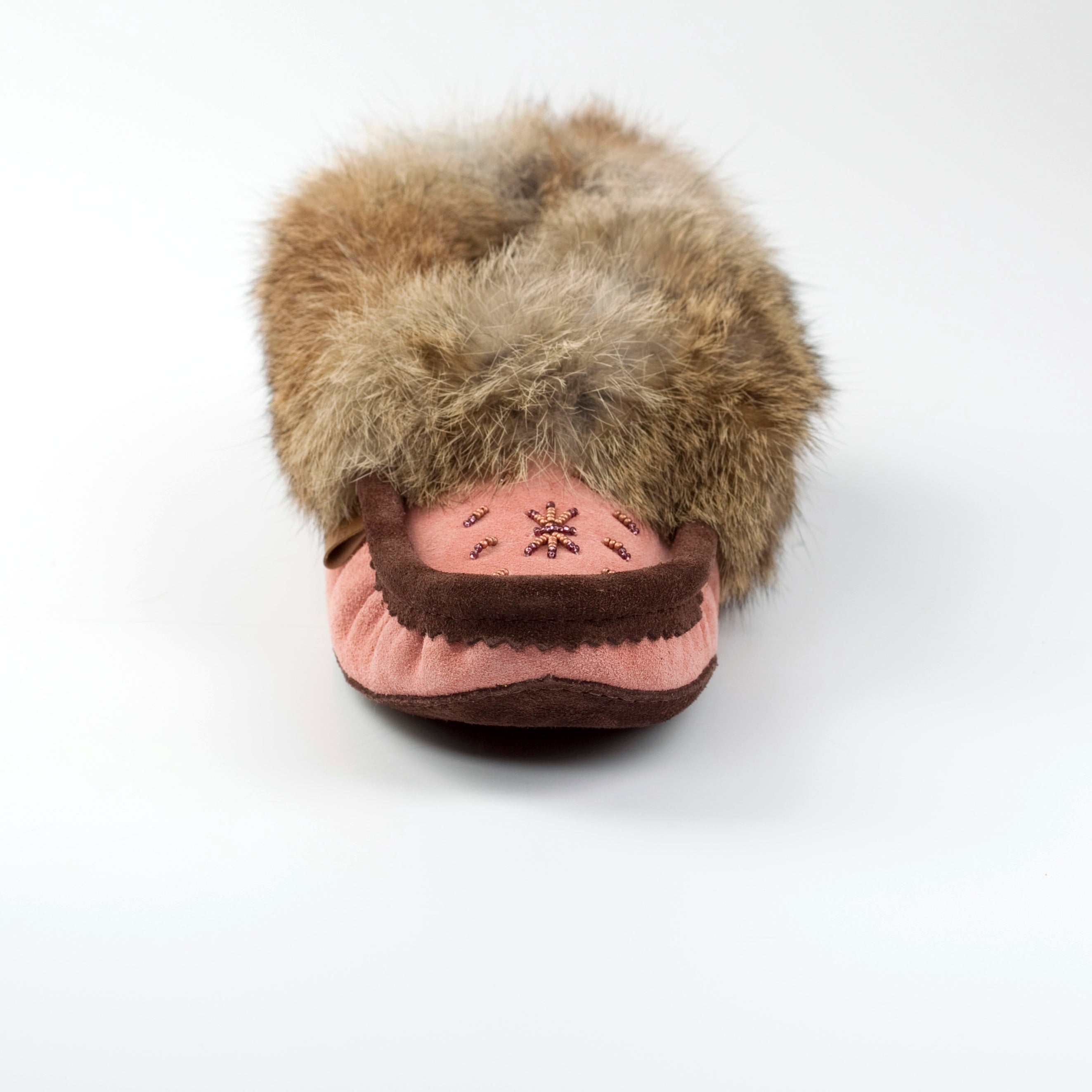 Slipper with fur trim on a white background