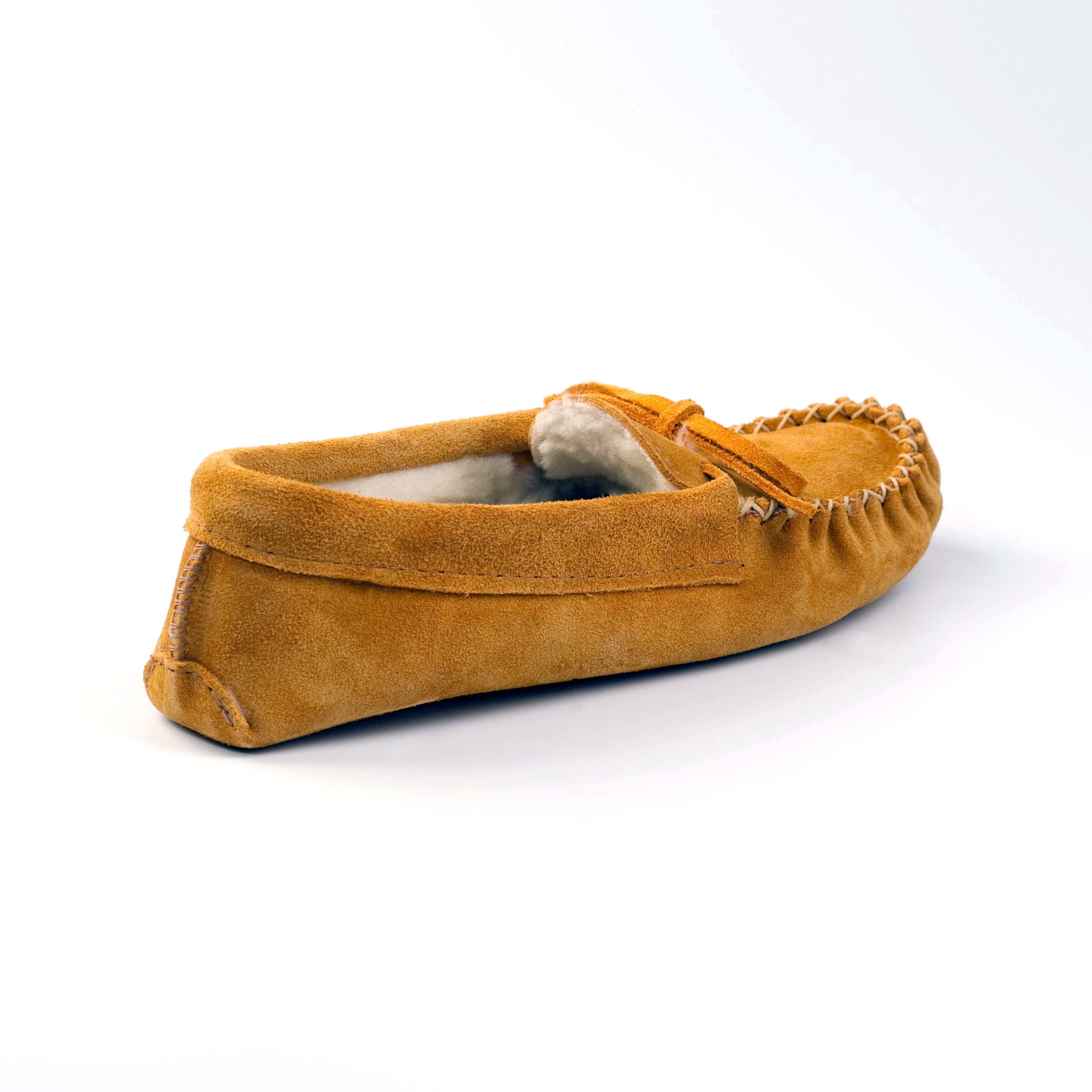 Brown moccasin slipper on a white background