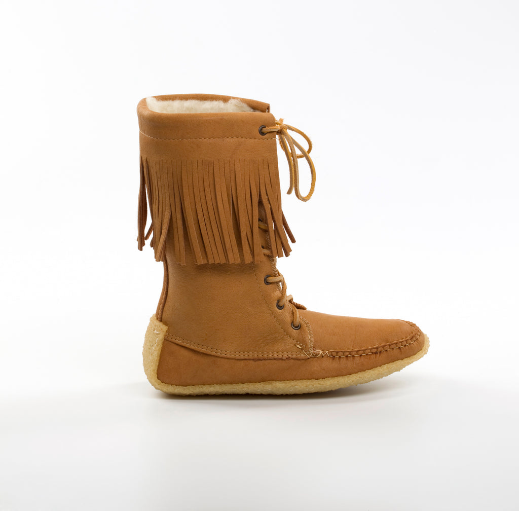 Brown moccasin boot with fringes on a white background
