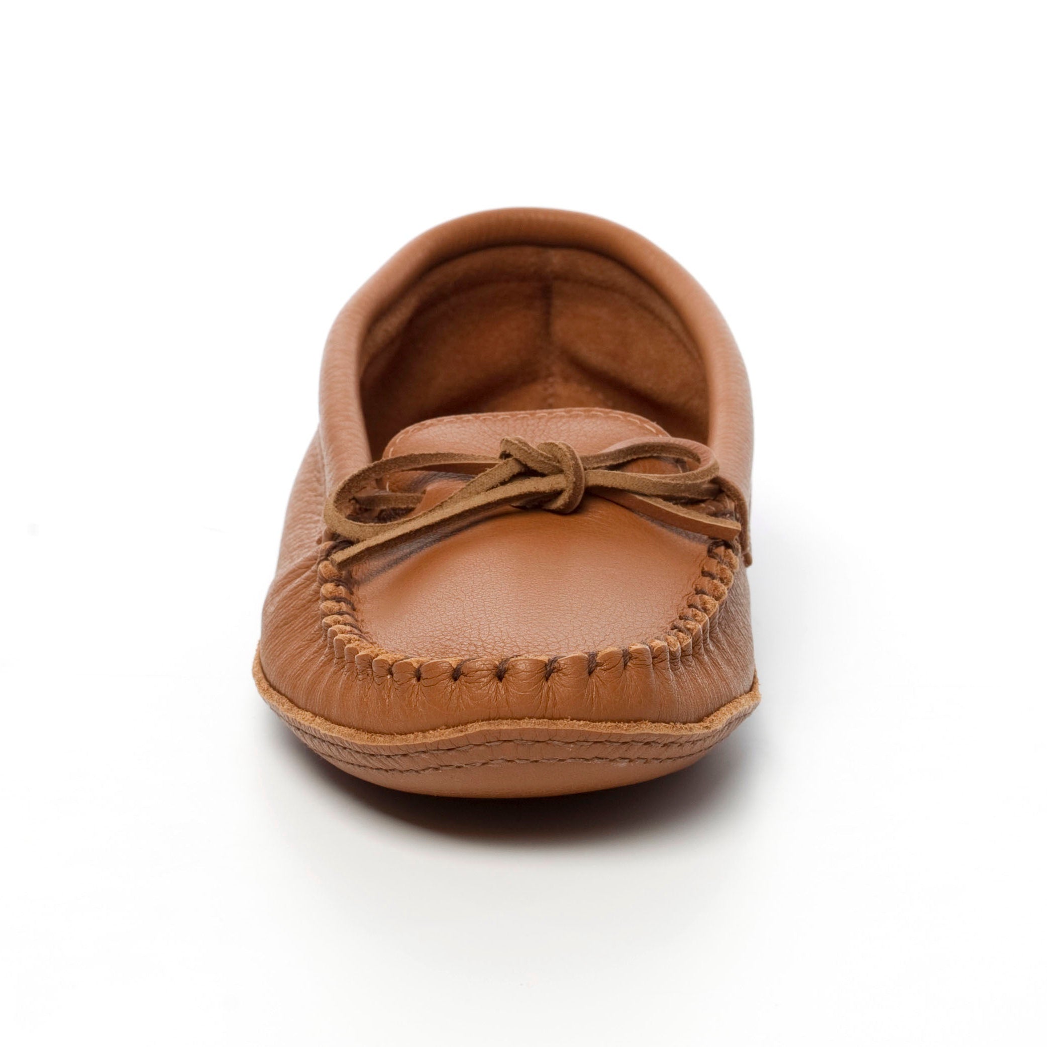 Brown moccasin shoe on a white background