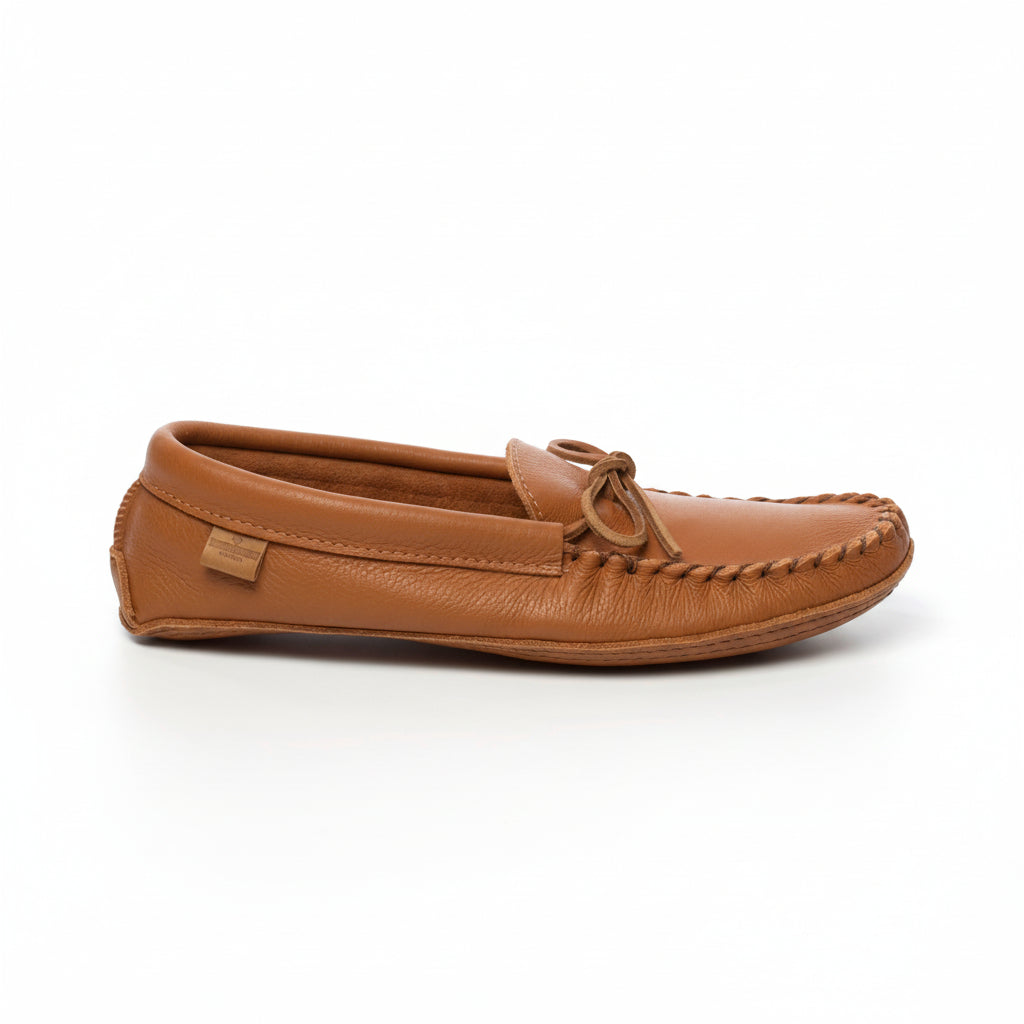 Brown leather moccasin shoe on a white background